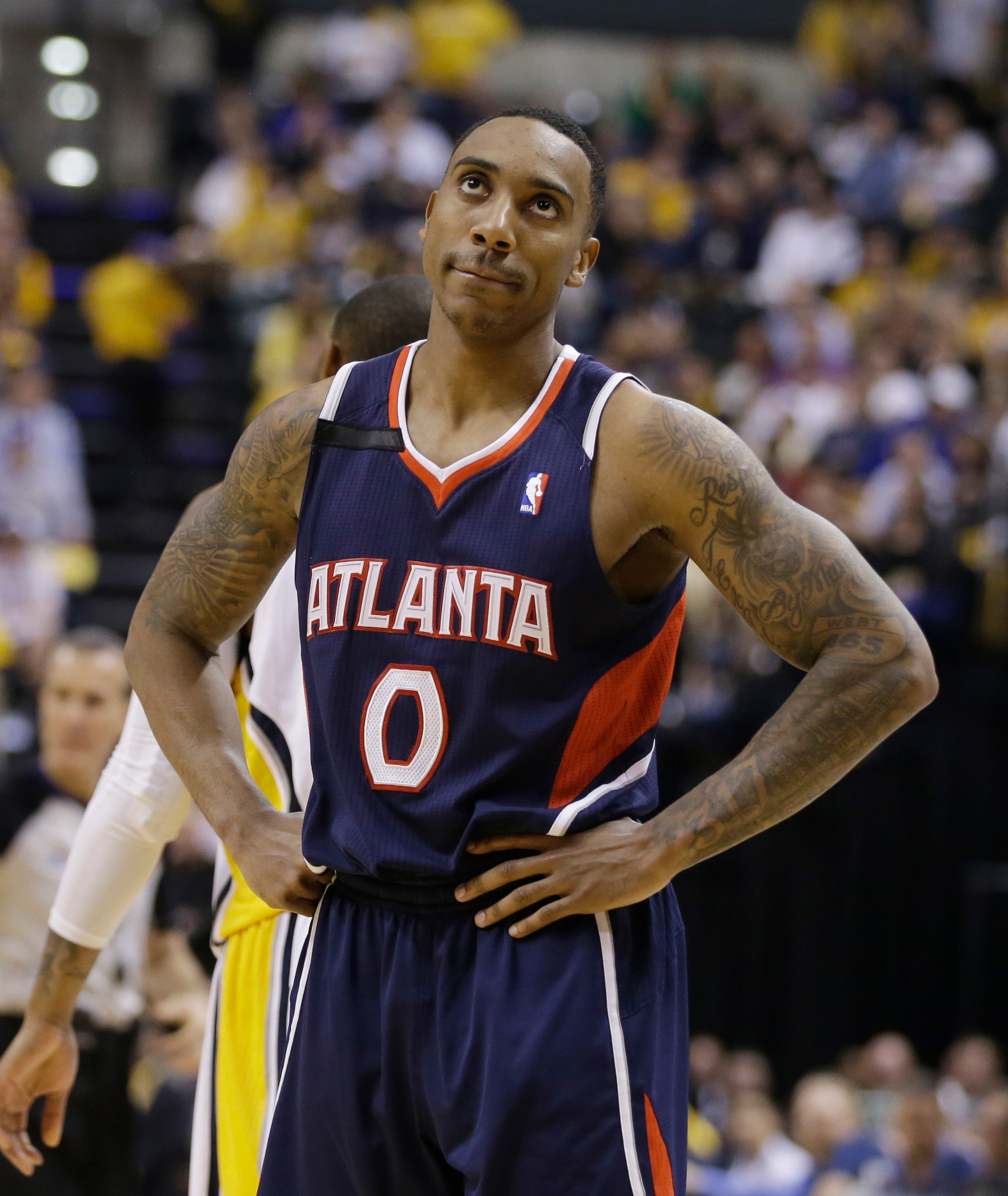 Atlanta Hawks' Jeff Teague looks up at the scoreboard during the second half in Game 2 of an opening-round NBA basketball playoff series against the Indiana Pacers Tuesday, April 22, 2014, in Indianapolis. Indiana defeated Atlanta 101-85. (AP Photo/Darron Cummings)