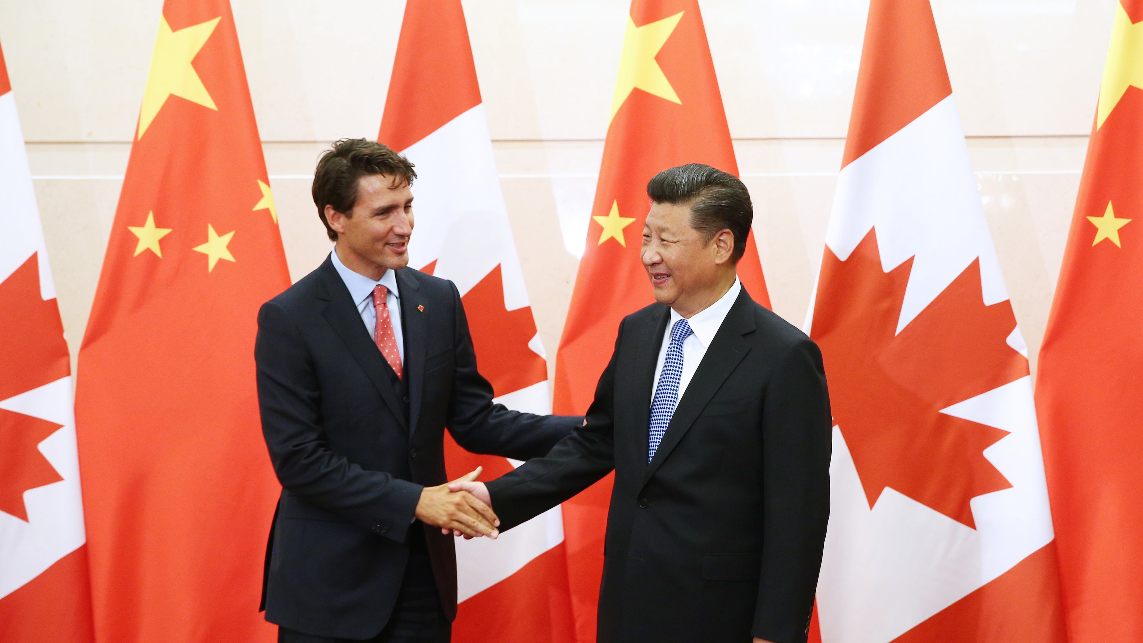 FILE - China's President Xi Jinping, right, shakes hands with Canada's Prime Minister Justin Trudeau before their meeting at the Diaoyutai State Guesthouse in Beijing, China, Wednesday, Aug. 31, 2016. (Wu Hong/Pool Photo via AP, File)