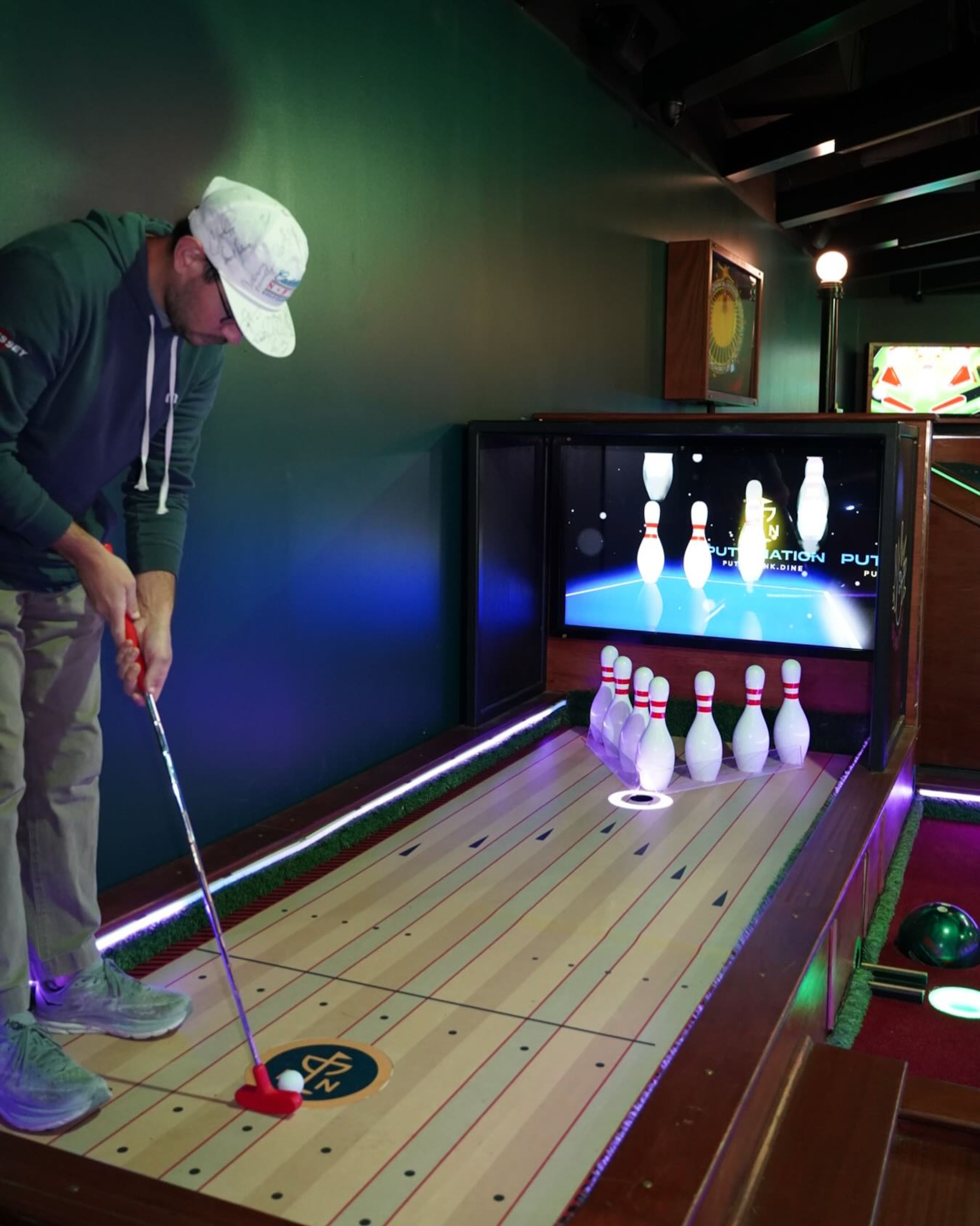 You’ll find interactive screens at each mini golf hole at Putt Nation in Buford. (courtesy of Putt Nation)