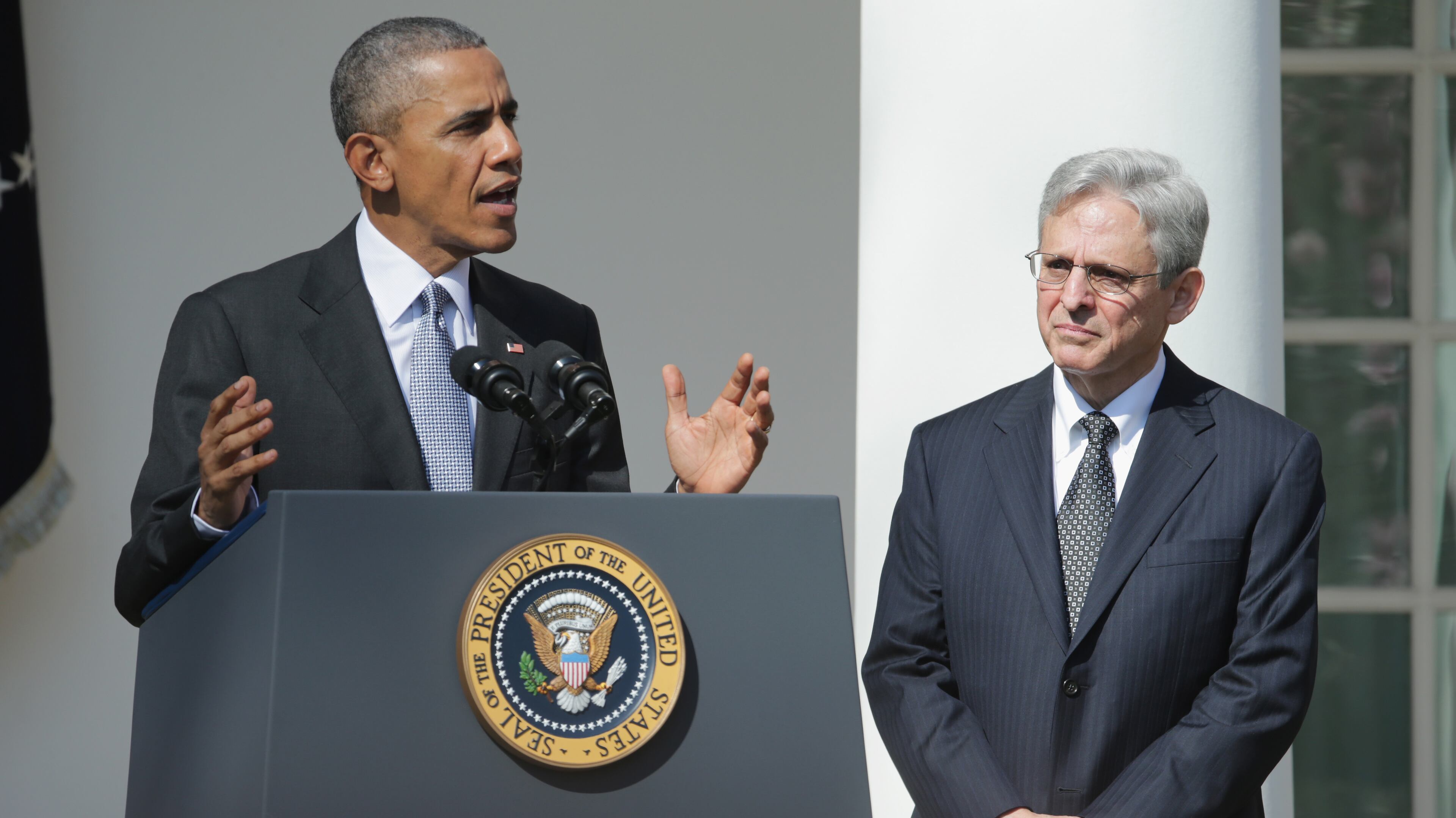 U.S. President Barack Obama (L) stands with Judge Merrick B. Garland, while nominating him to the US Supreme Court, in the Rose Garden at the White House, March 16, 2016 in Washington, DC. Garland currently serves as the chief judge on the United States Court of Appeals for the District of Columbia Circuit, and if confirmed by the US Senate, would replace Antonin Scalia who died suddenly last month. (Photo by Chip Somodevilla/Getty Images)