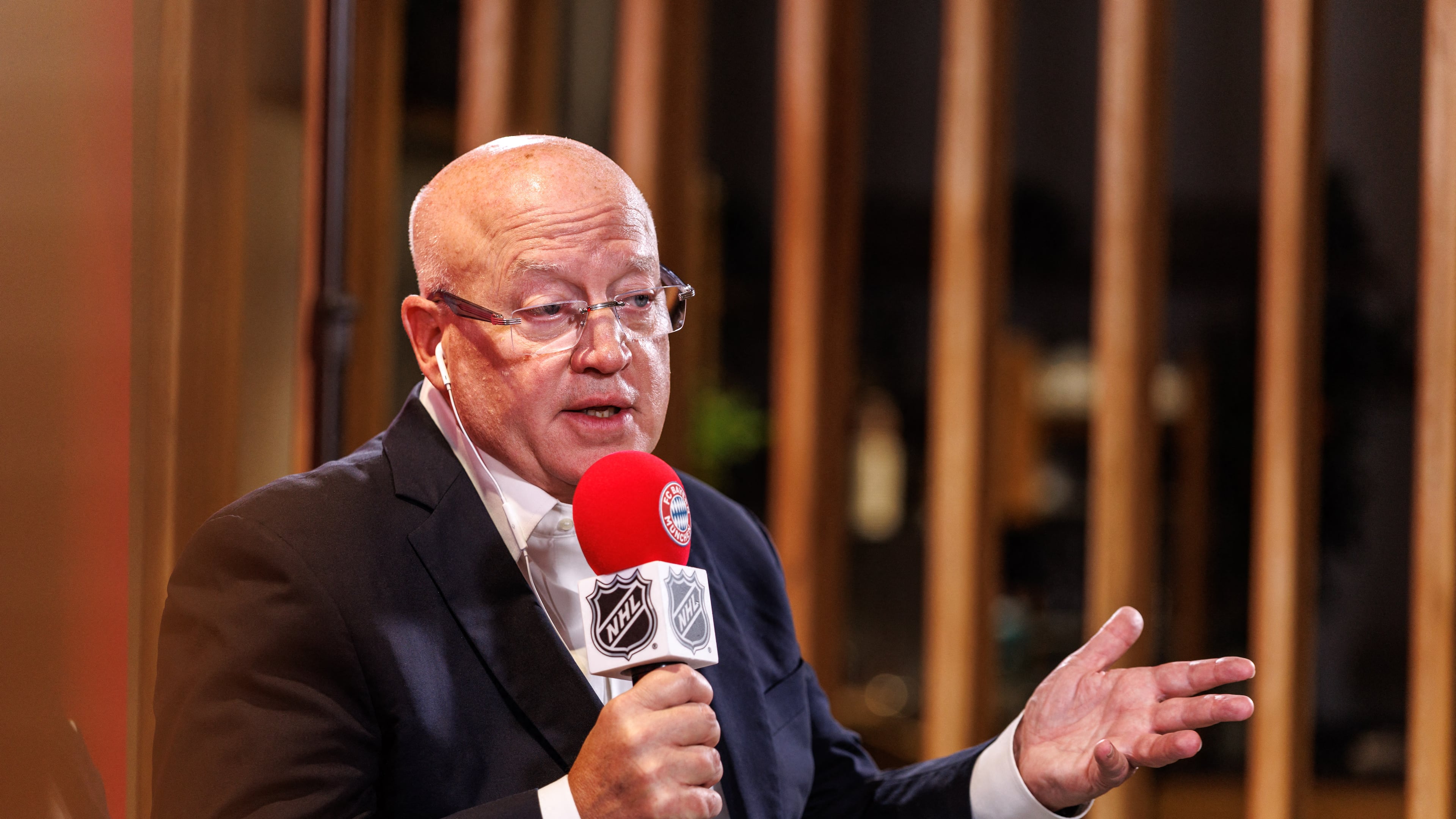 Bill Daly, deputy commissioner of the NHL, speaks during a joint press conference by FC Bayern Munich and the National Hockey League, Thursday, Aug. 20, 2026, in Munich. (Matthias Balk/dpa via AP)