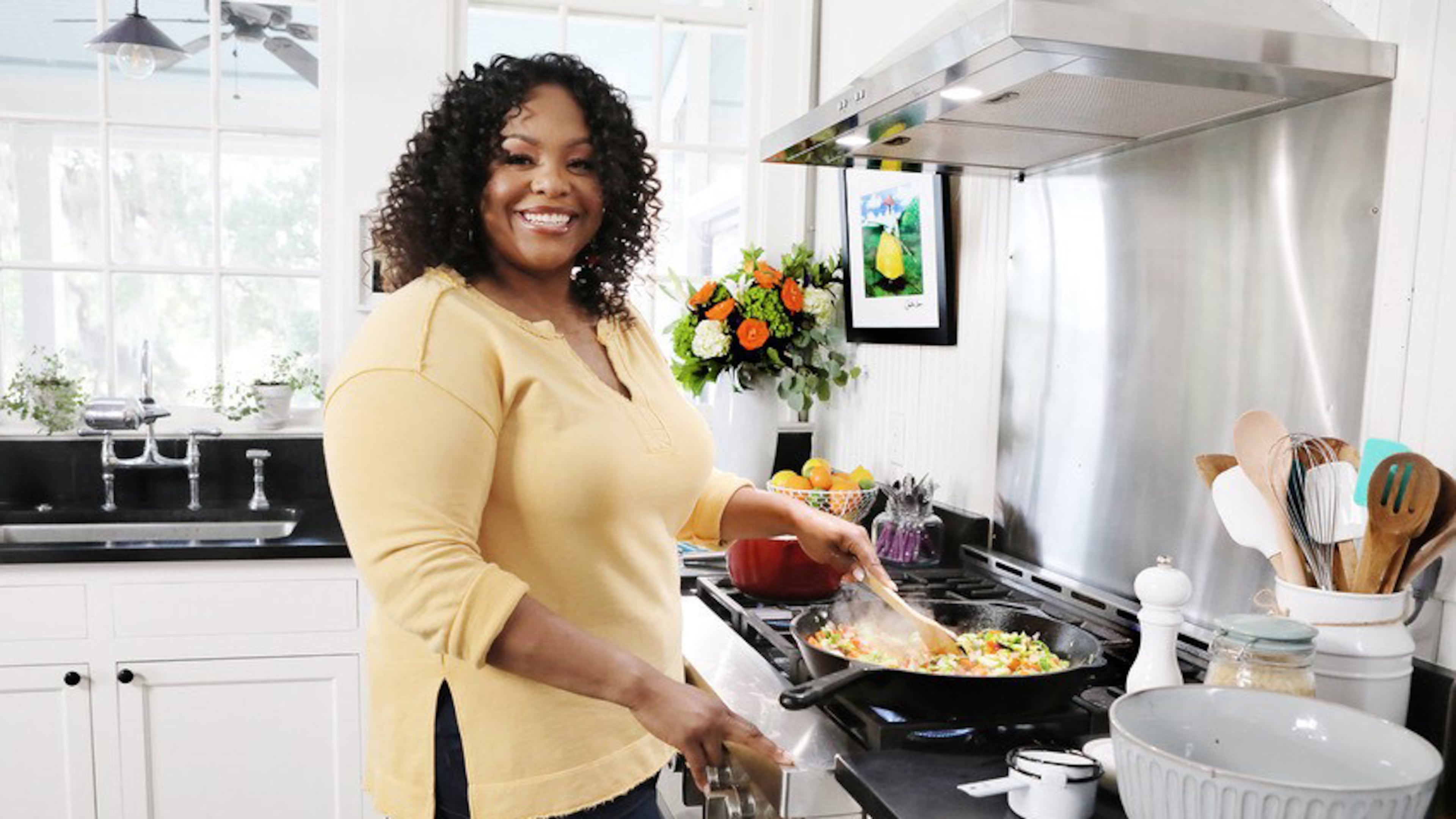 Kardea Brown, who spent her formative years in Atlanta and Charleston, S.C., pays homage to her Gullah-Geechee roots on her Food Network series, "Delicious Miss Brown," and now in her first cookbook, "The Way Home: A Celebration of Sea Islands Food and Family With Over 100 Recipes" (Amistad, $34.99). (Courtesy of Sully Sullivan)