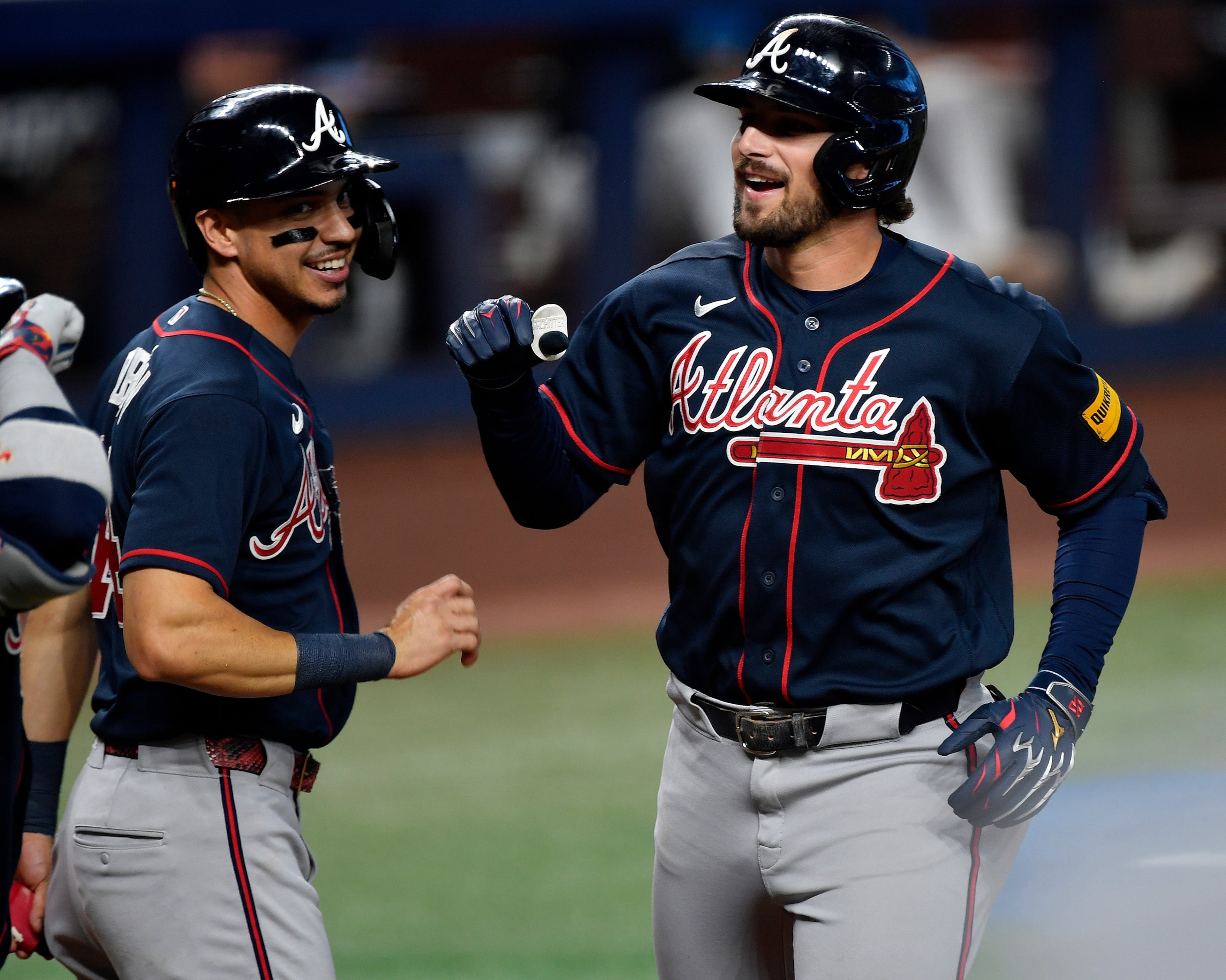 Austin Riley (right) celebrates a Wednesday night home run. (Michael Laughlin/AP)