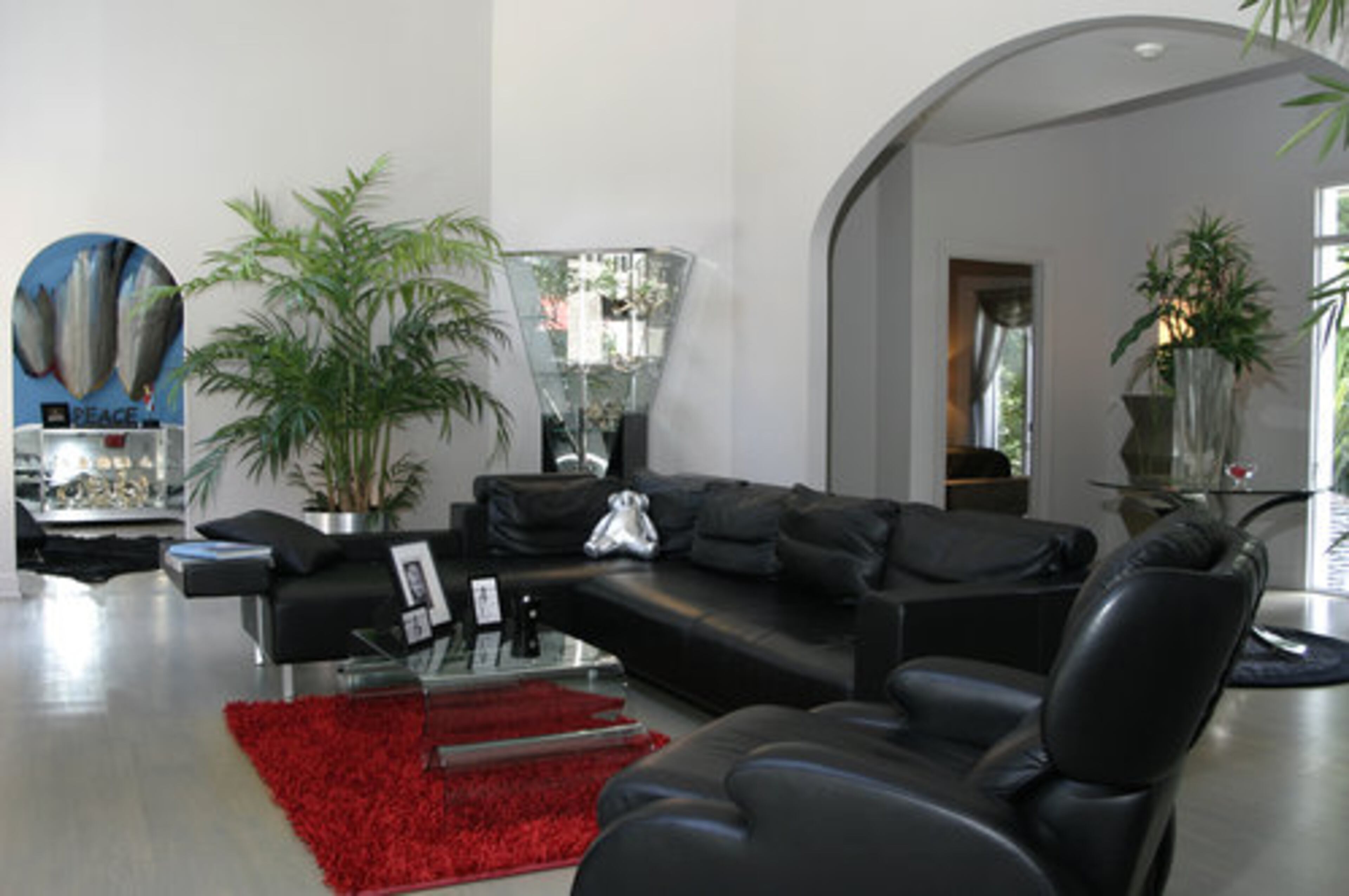 The family room is where the Huffs spend most of their time. Julie Huff plans to change out the red rug for fresh inspiration.