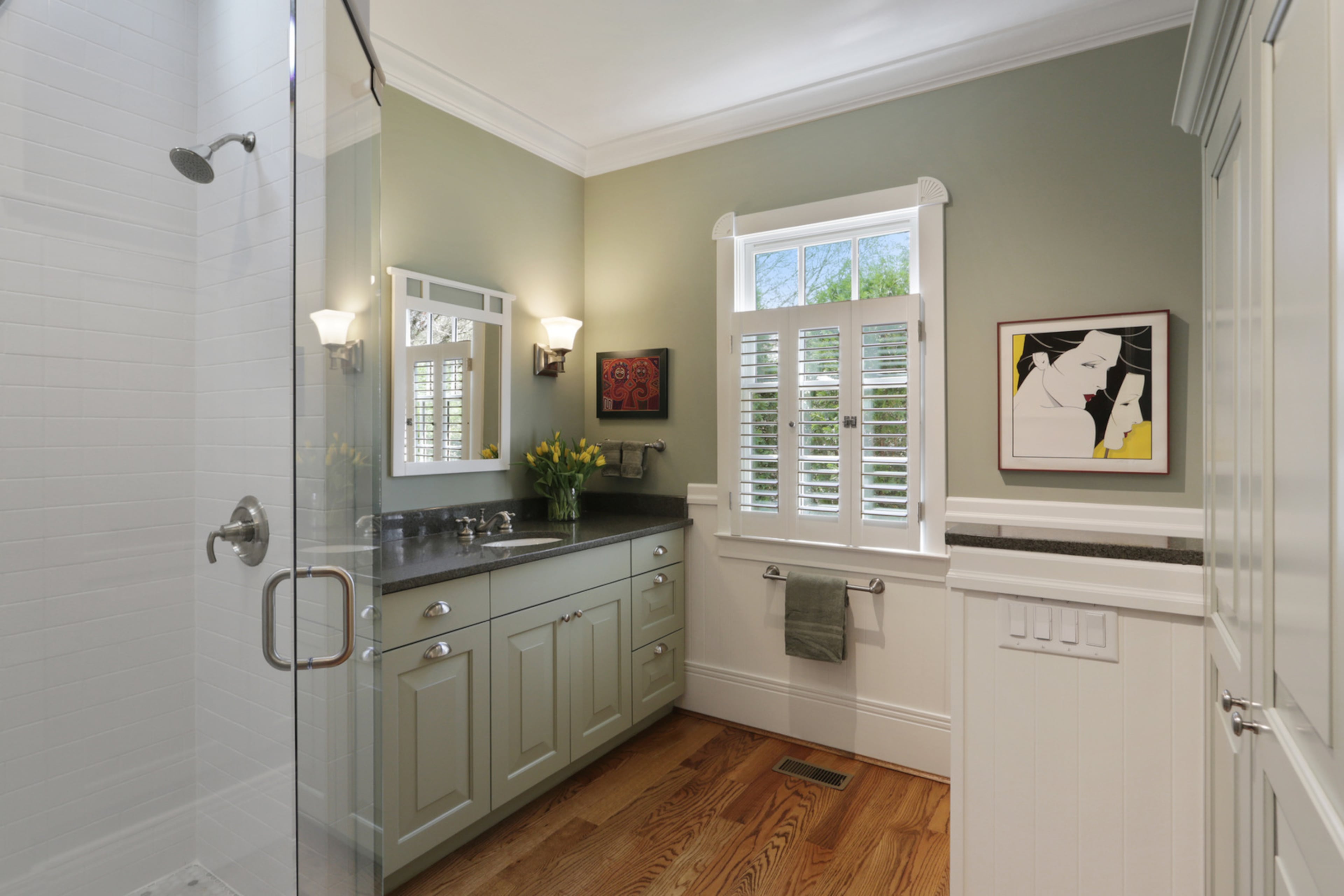 One of the two private secondary bathrooms in the home, each of them thoughtfully and tastefully done. Text by Jill Huitron