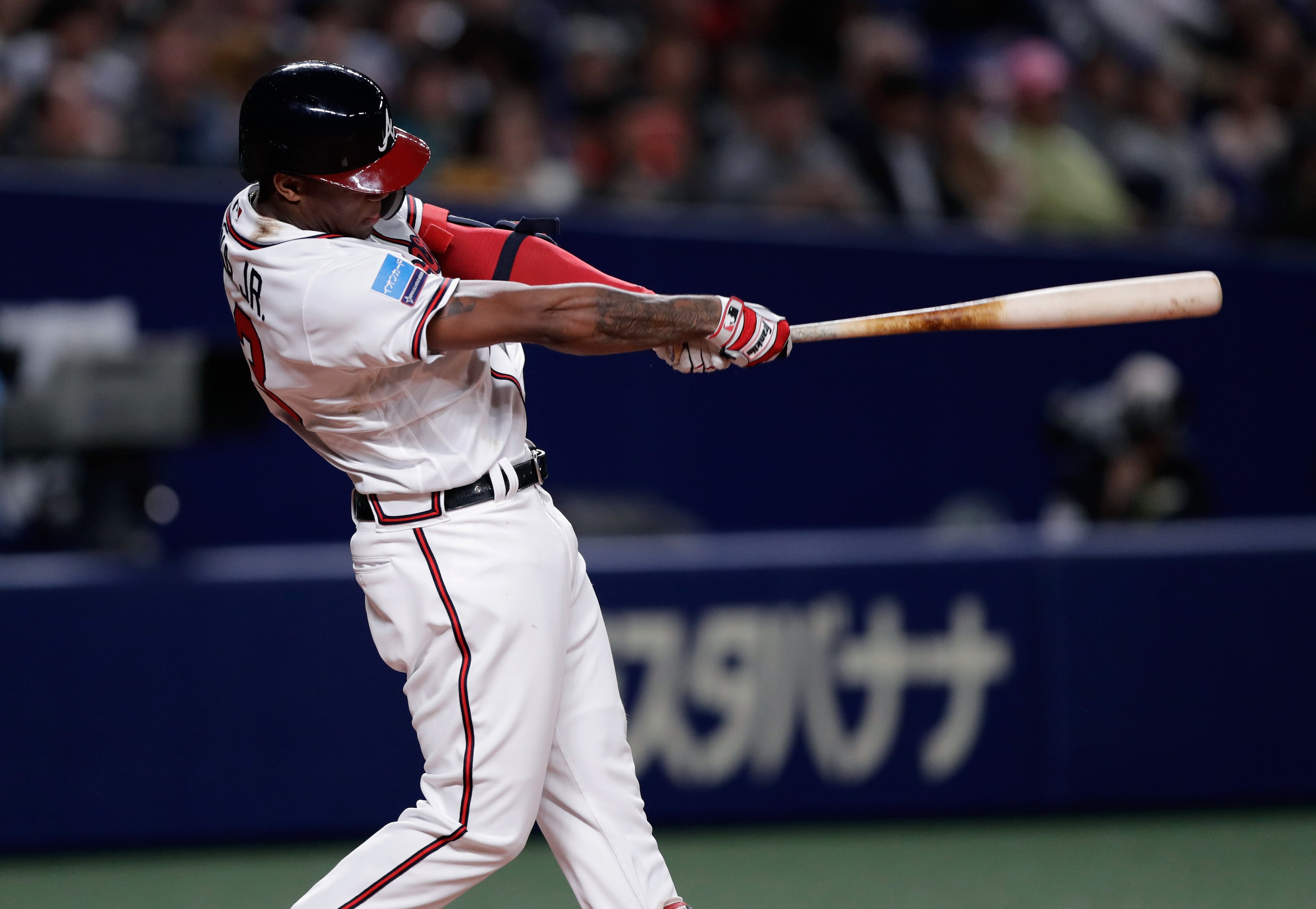 NAGOYA, JAPAN - NOVEMBER 15: Outfielder Ronald Acuna Jr. #13 of the Atlanta Braves hits a solo home run in the bottom of 8th inning during the game six between Japan and MLB All Stars at Nagoya Dome on November 15, 2018 in Nagoya, Aichi, Japan. (Photo by Kiyoshi Ota/Getty Images)