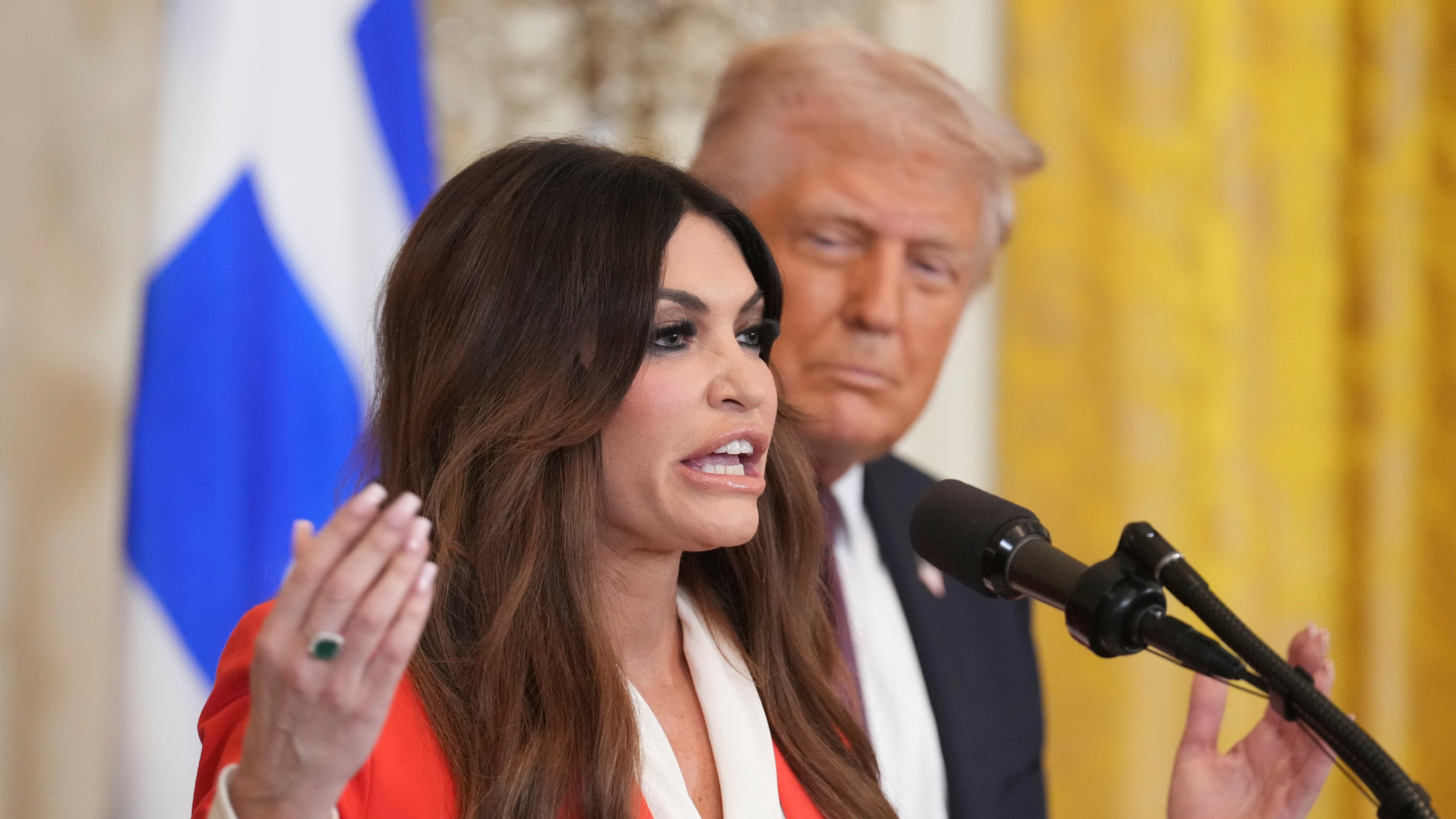 FILE - Kimberly Guilfoyle speaks as President Donald Trump listens at a reception celebrating Greek Independence Day in the East Room of the White House, March 24, 2025, in Washington. (AP Photo/Jacquelyn Martin, File)
