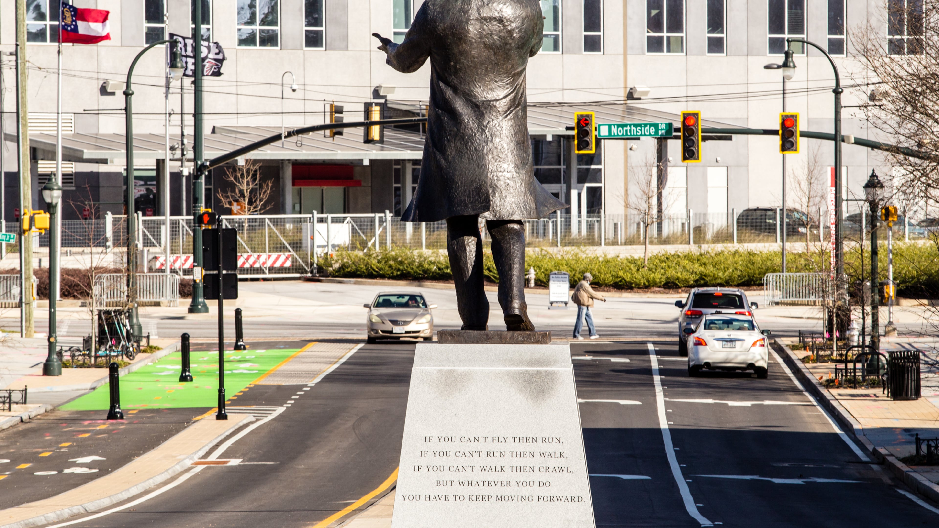 City of Atlanta unveils the bronze statue "Hope Moving Forward" honoring the life and legacy of Dr. Martin Luther King Jr. on Friday, January 15, 2021 near the intersection of Northside Drive and MLK Jr Drive. This is the first of seven art installations commissioned by the city to honor MLK. (Jenni Girtman for The Atlanta Journal Constitution)