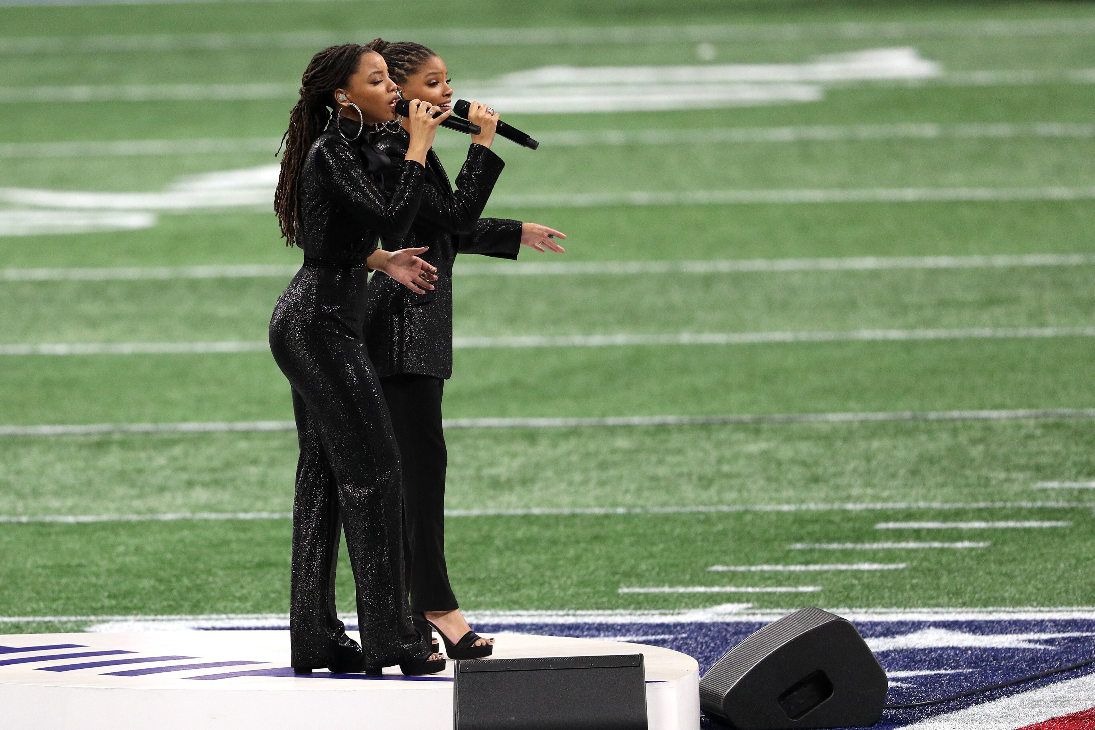Chloe Bailey and Halle Bailey of Chloe x Halle perform America the Beautiful prior to Super Bowl LIII between the New England Patriots and the Los Angeles Rams at Mercedes-Benz Stadium on February 03, 2019 in Atlanta, Georgia. (Photo by Patrick Smith/Getty Images)