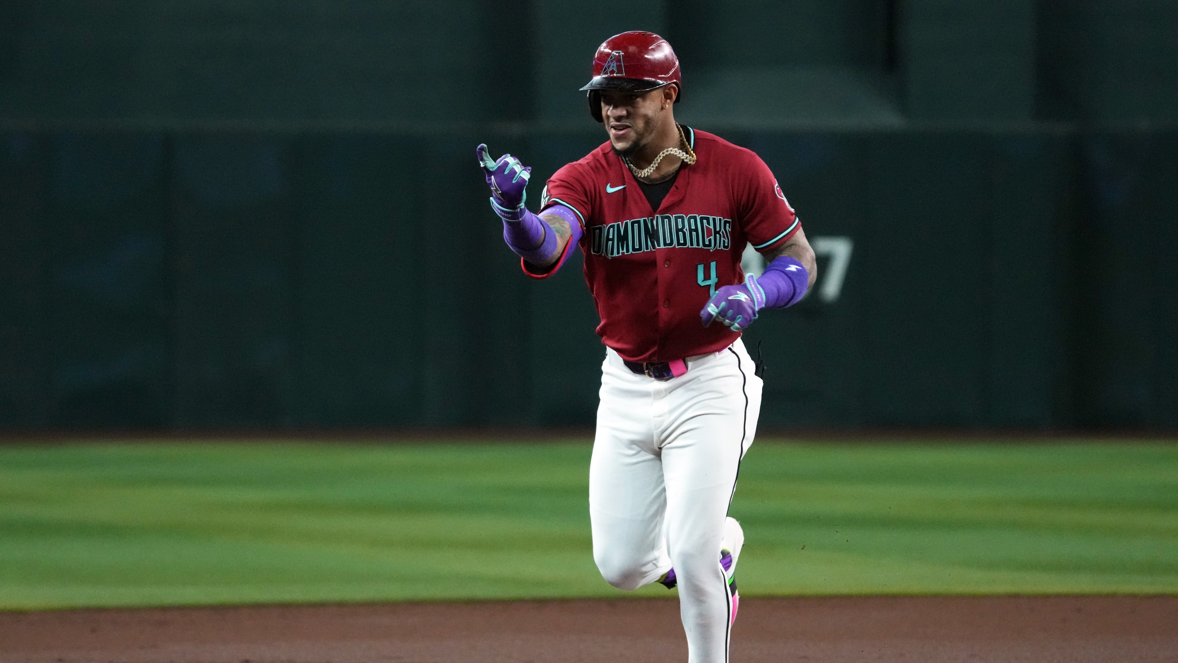 Arizona Diamondbacks' Ketel Marte reacts after hitting a solo home run against the Colorado Rockies in the first inning of a baseball game, Tuesday, Aug. 11, 2026, in Phoenix. (AP Photo/Rick Scuteri)
