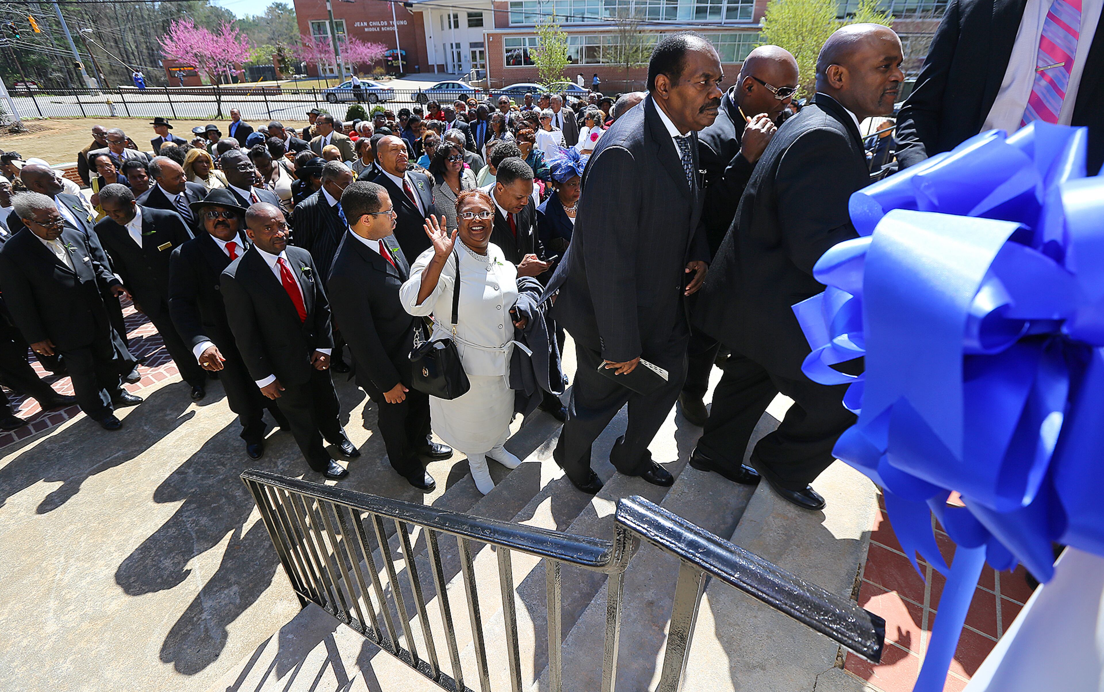 Church members climb the stairs into their new sanctuary during the Entrance Service at Mount Vernon Baptist Church on Palm Sunday, March 29, 2015, in Atlanta. Curtis Compton / ccompton@ajc.com