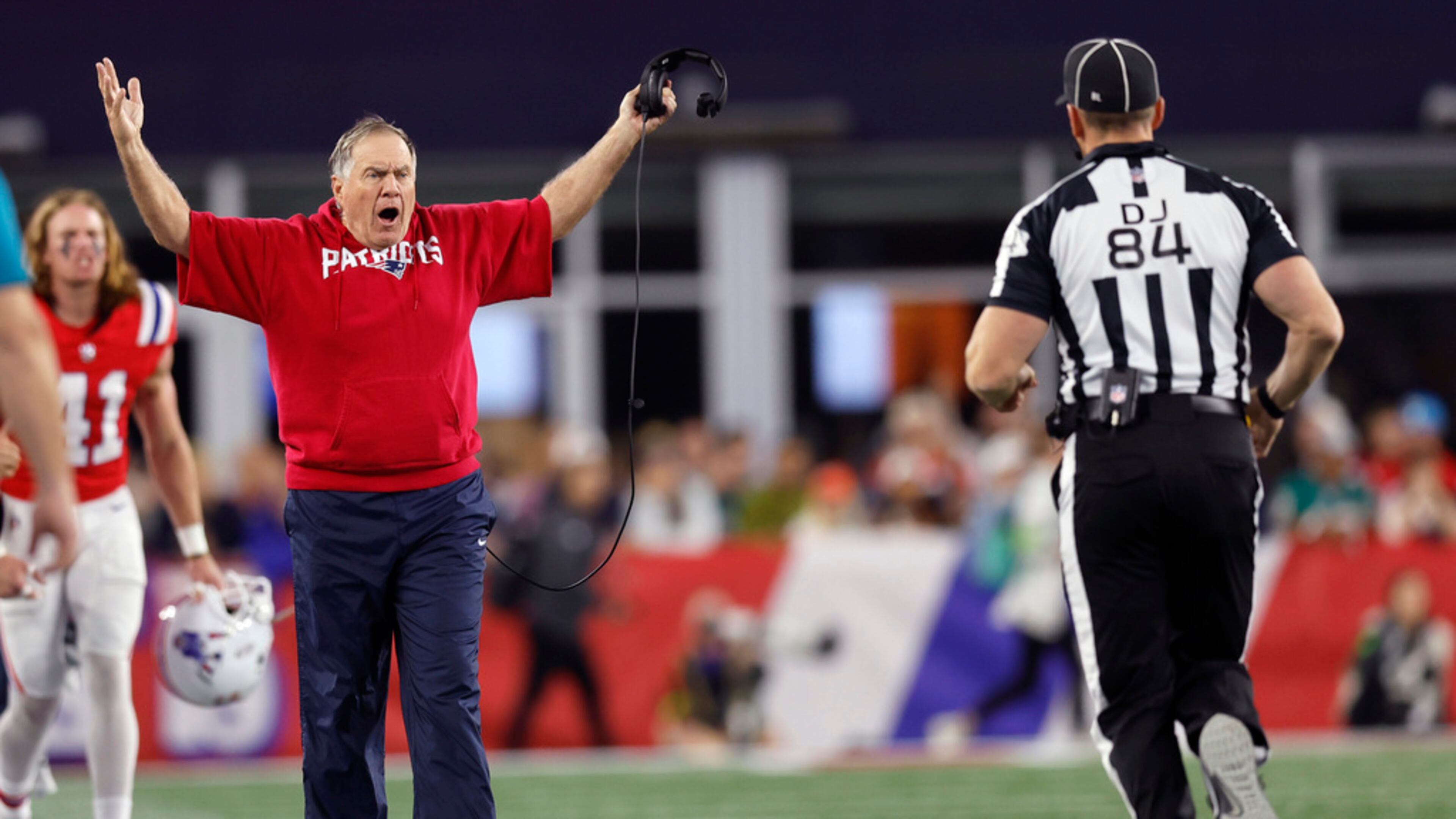 New England Patriots head coach Bill Belichick argues with officials after a call during the fourth quarter of an NFL football game against the Miami Dolphins, Sunday, Sept. 17, 2023, in Foxborough, Mass. (AP Photo/Michael Dwyer)