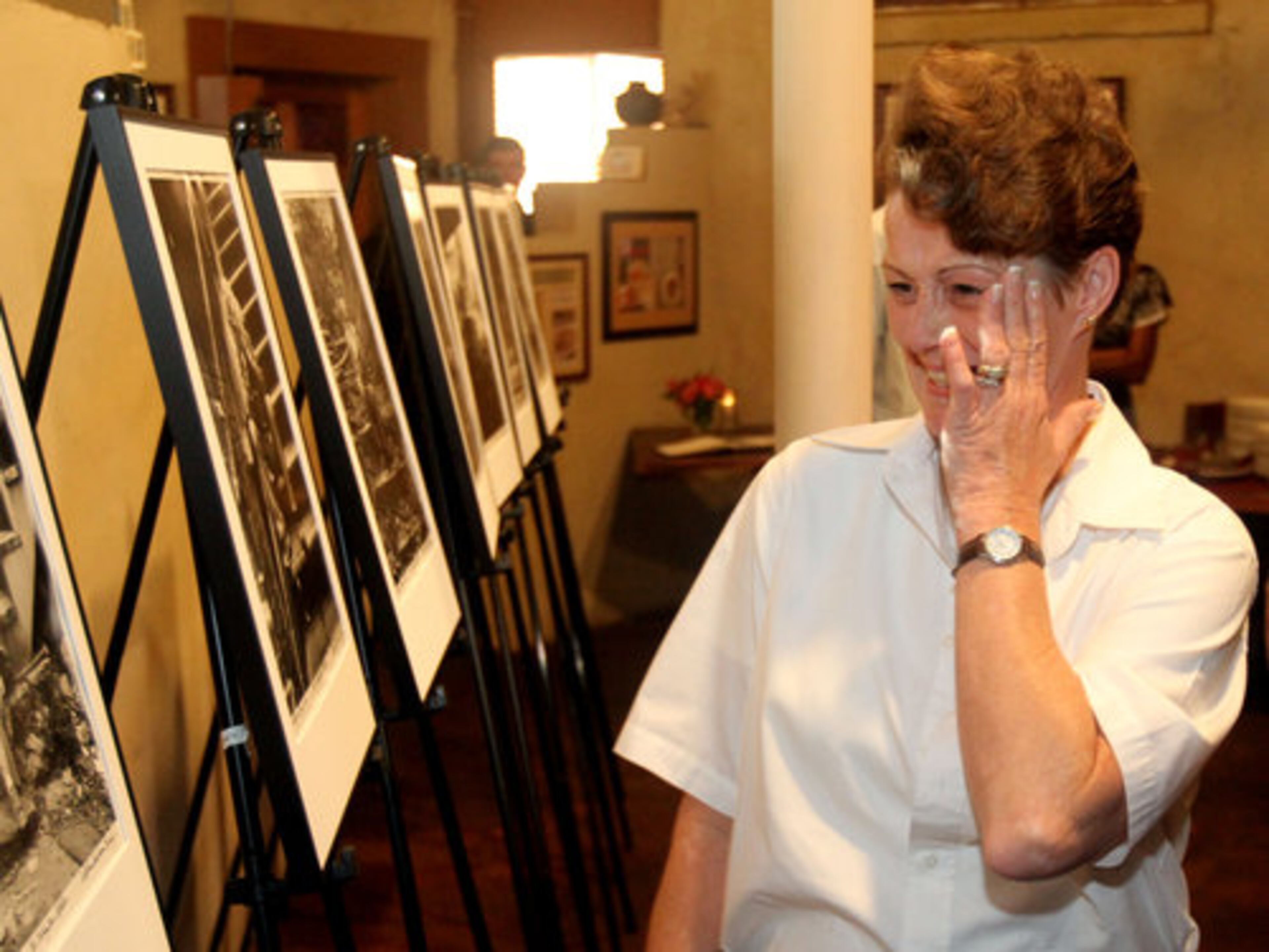 "Look at the holes in those sneakers," said Lisa Maddox, 44, after looking at an image of her 9-year-old self at Agave restaurant, former home of The Patch community center where she and her friends used to hang out.