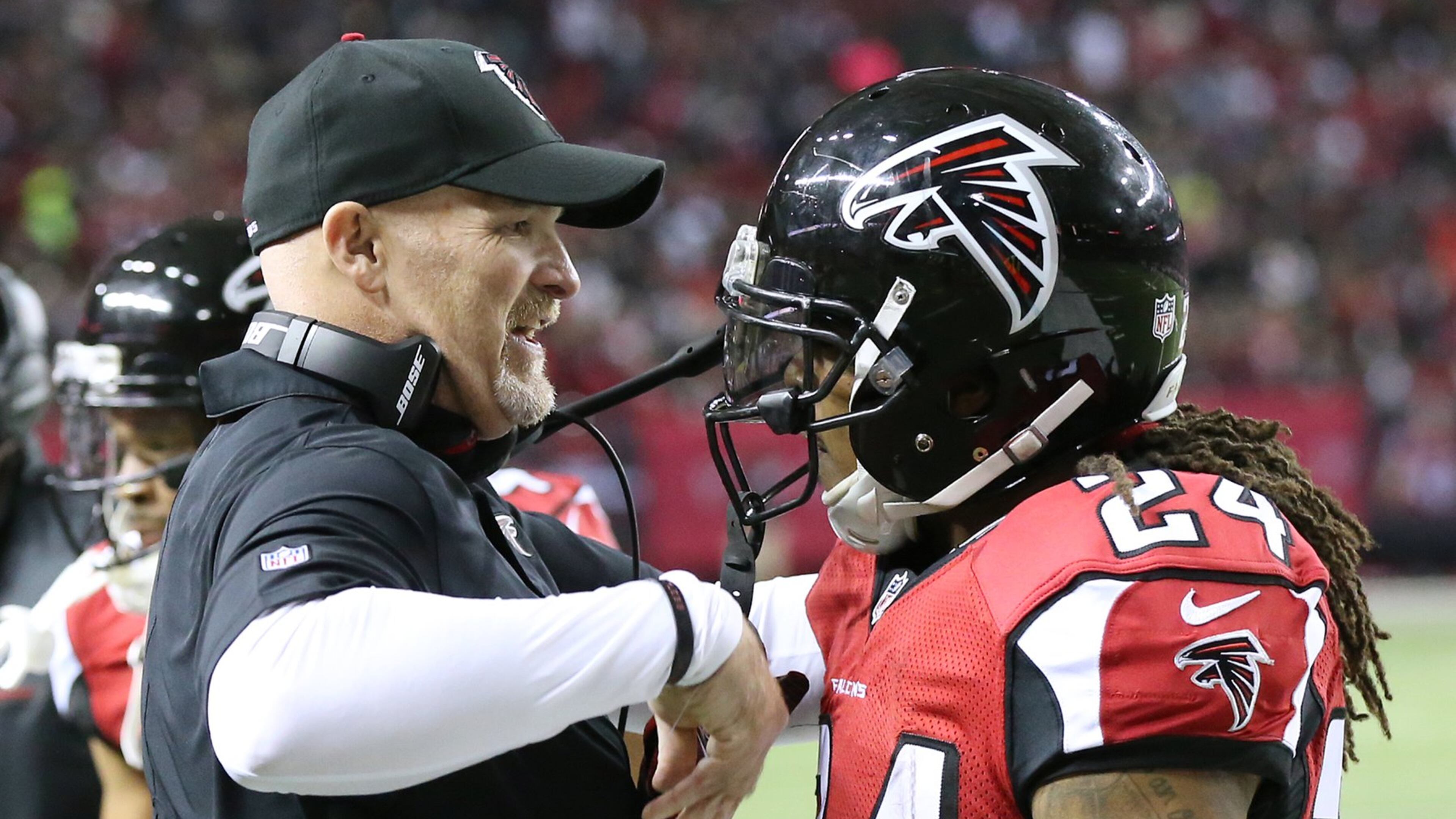 January 1, 2017, Atlanta: Falcons head coach Dan Quinn celebrates with running back Devonta Freeman after his 75-yard touchdown run against the Saints in an NFL football game on Sunday, Jan. 1, 2017, in Atlanta. Curtis Compton/ccompton@ajc.com