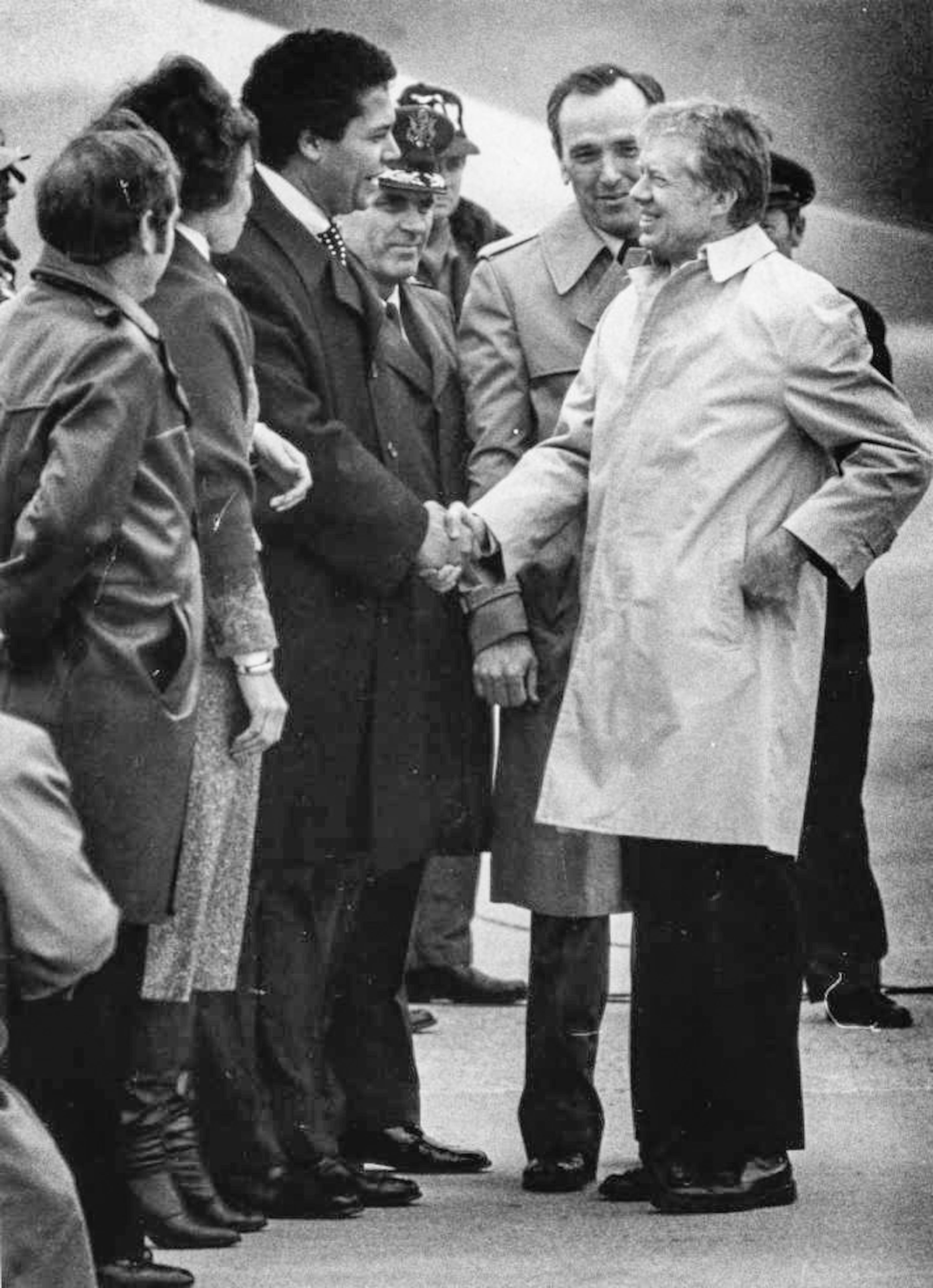 Atlanta Mayor Maynard Jackson greets President Jimmy Carter at Dobbins Air Force Base, Georgia, January 20, 1978.