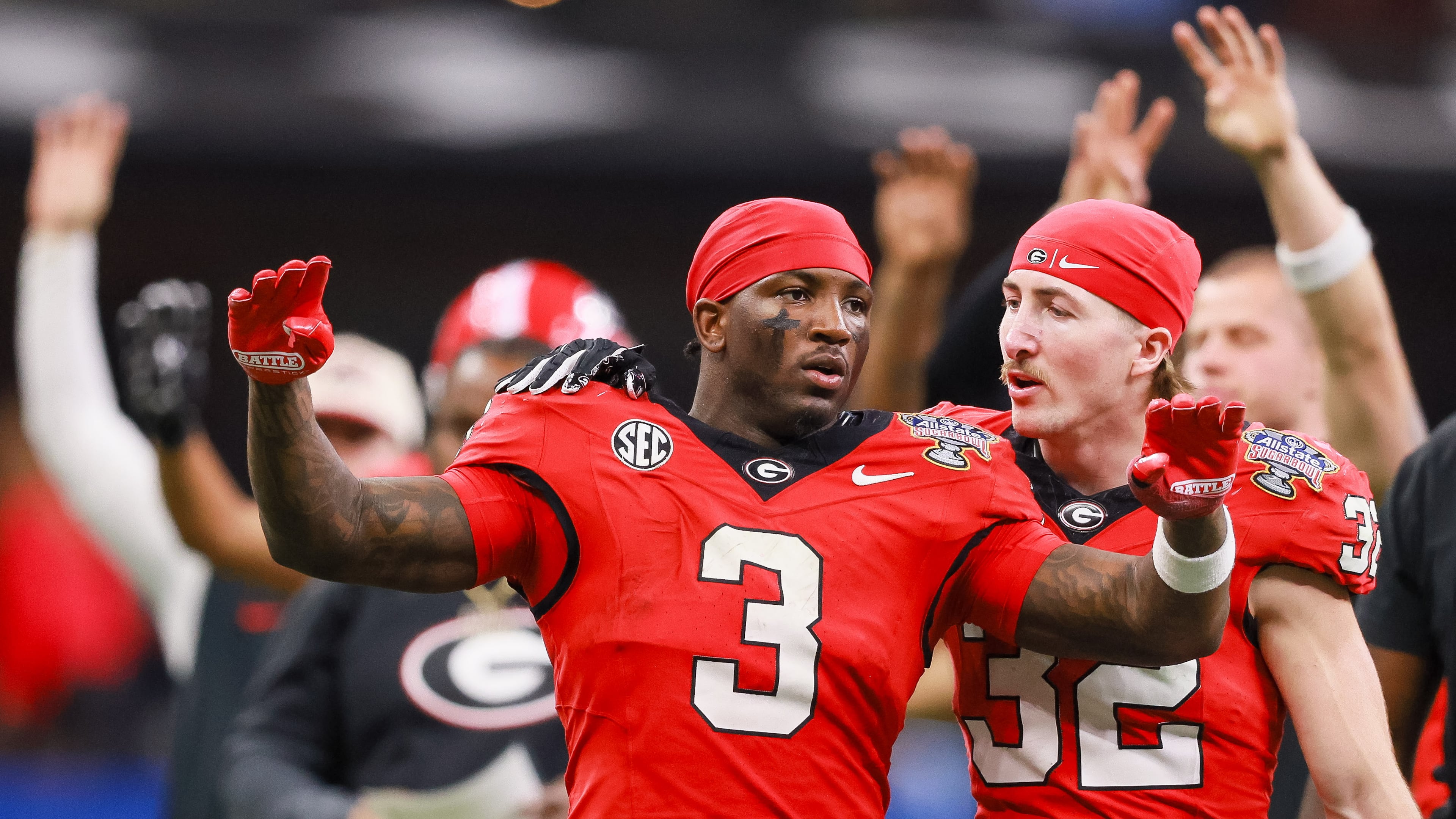 Georgia running back Nate Frazier (center) — pictured with Cash Jones during the Bulldogs' Sugar Bowl game Thursday, Jan. 1, 2026 — is considering entering the transfer portal ahead of Friday's deadline. (Jason Getz/AJC)