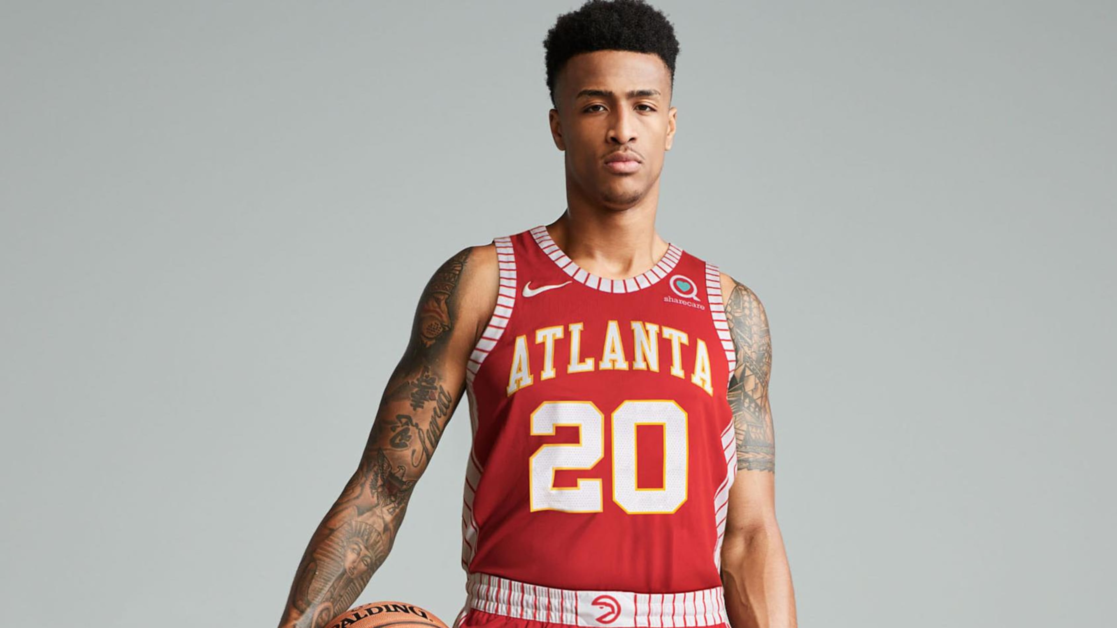John Collins models the uniform the Hawks will wear Saturday night. (Photo courtesy of the Atlanta Hawks).