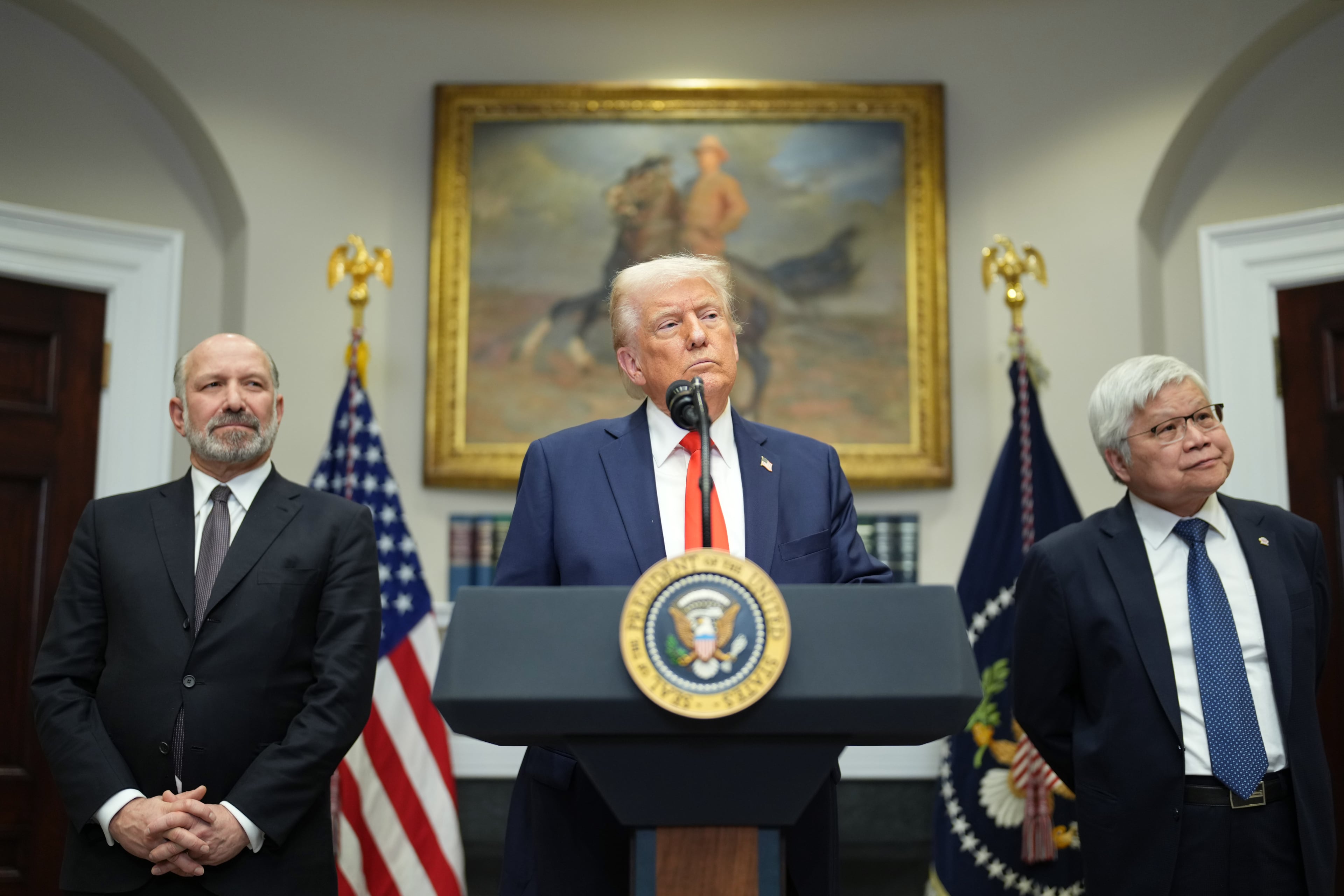 President Donald Trump speaks to reporters as Commerce Secretary Howard Lutnick, left, and C.C. Wei, TSMC’s chief executive, look on in the Roosevelt Room of the White House in Washington on Monday, March 3, 2025. Taiwan Semiconductor Manufacturing Company, the world’s largest chip manufacturer, intends to spend $100 billion in the United States over the next four years to expand its production capacity and bring its most advanced semiconductor processes to its operations in Arizona. (Doug Mills/The New York Times)