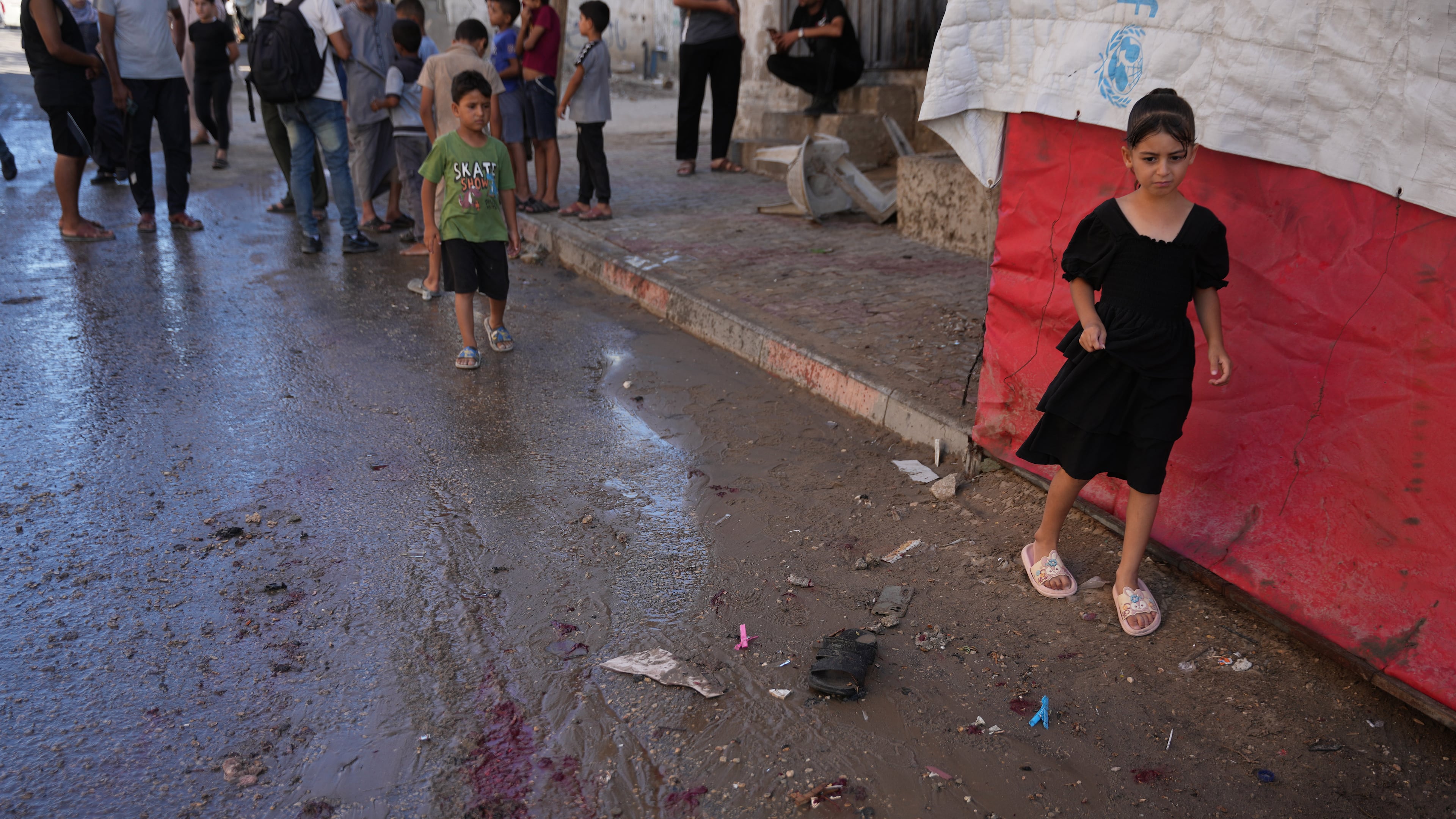 Palestinians inspect the site of an Israeli airstrike in Nuseirat, central Gaza Strip, Friday, July 17, 2026. (AP Photo/Abdel Kareem Hana)