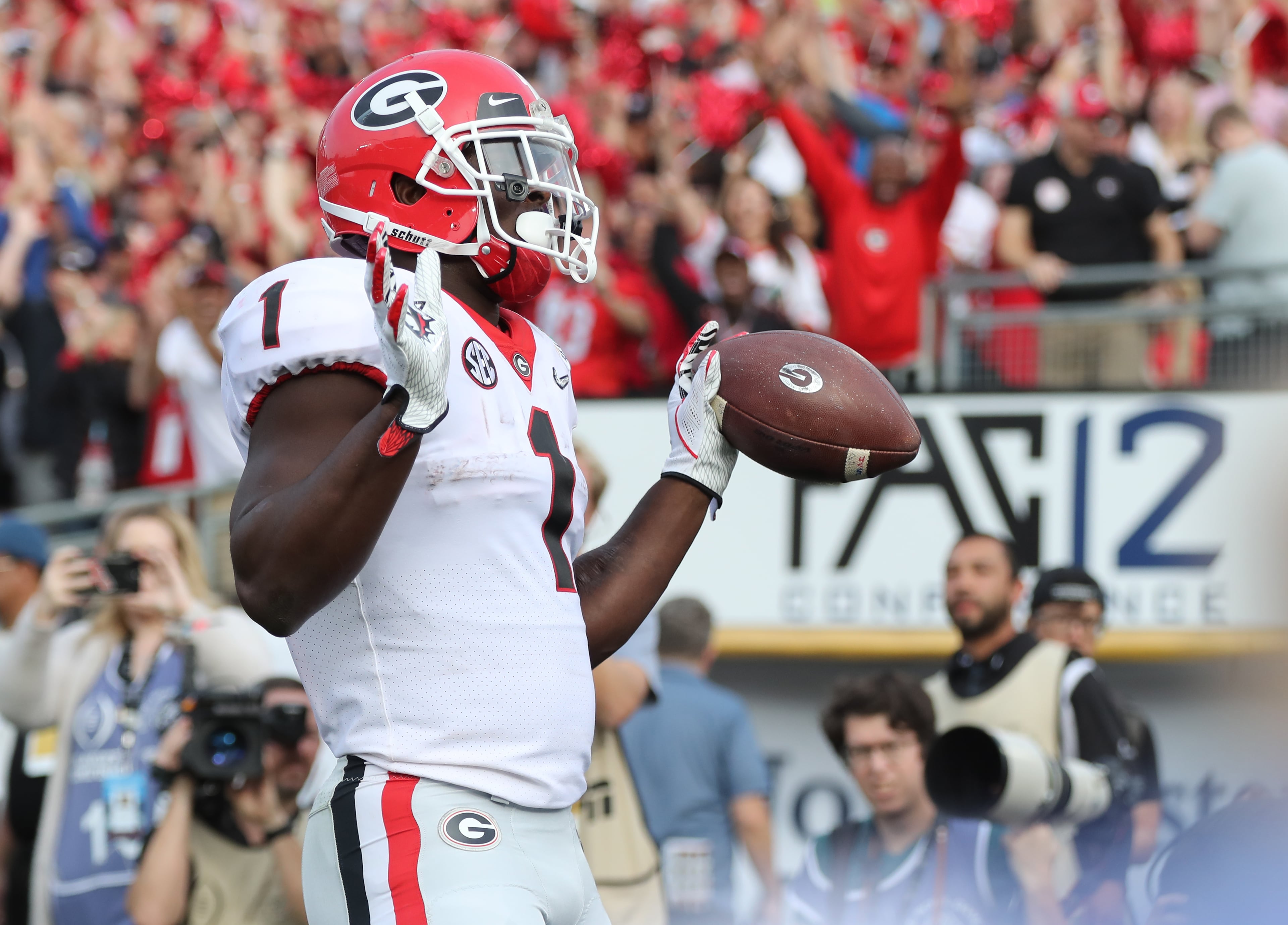 January 1, 2018 Pasadena: Georgia Bulldogs running back Sony Michel (1) scores Georgia's first TD in the first quarter at the College Football Playoff Semifinal at the Rose Bowl Game on Monday, January 1, 2018, in Pasadena. Curtis Compton/ccompton@ajc.com