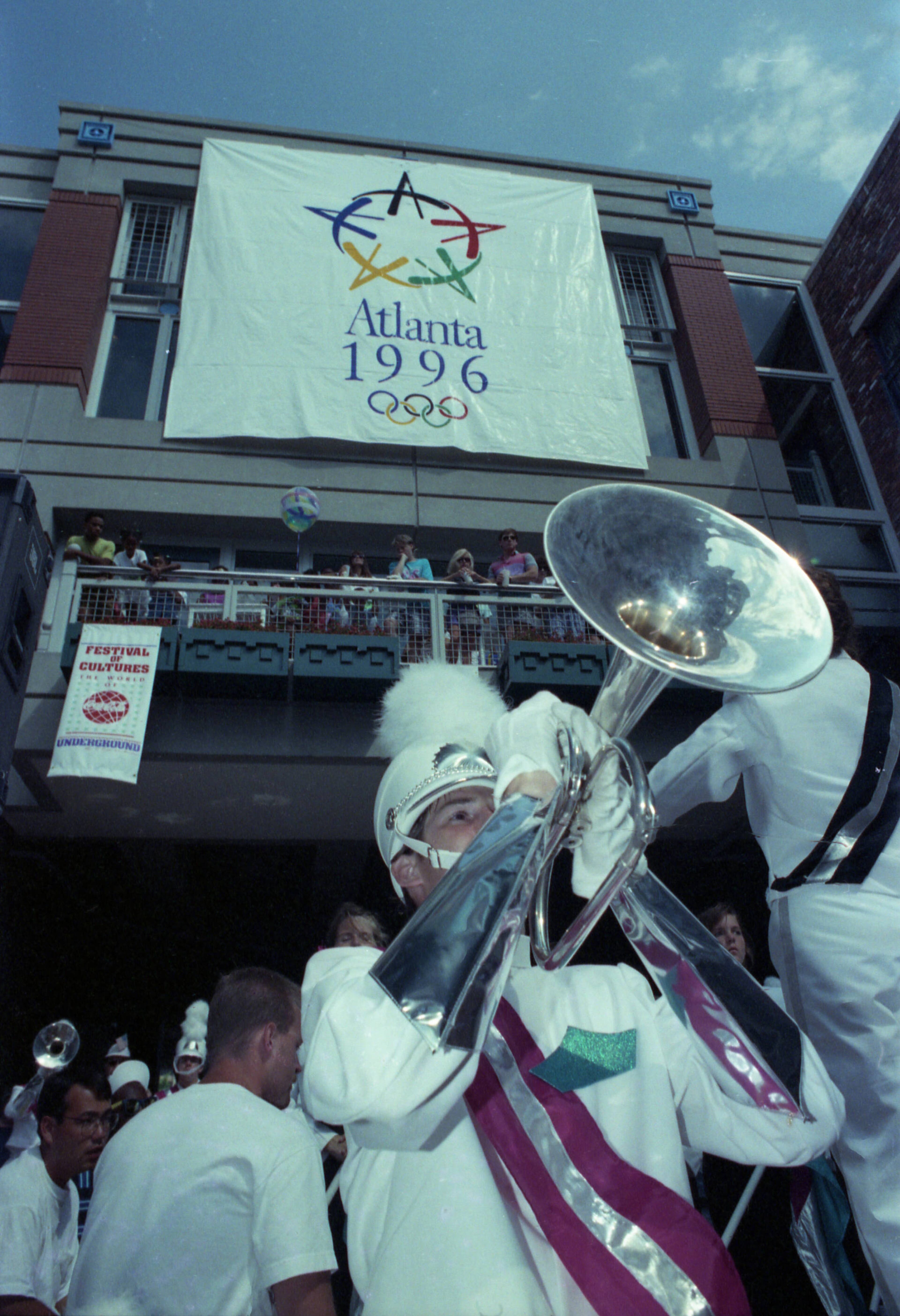 Marching band performs at an Olympic pep rally in Underground Atlanta, July 4, 1990.