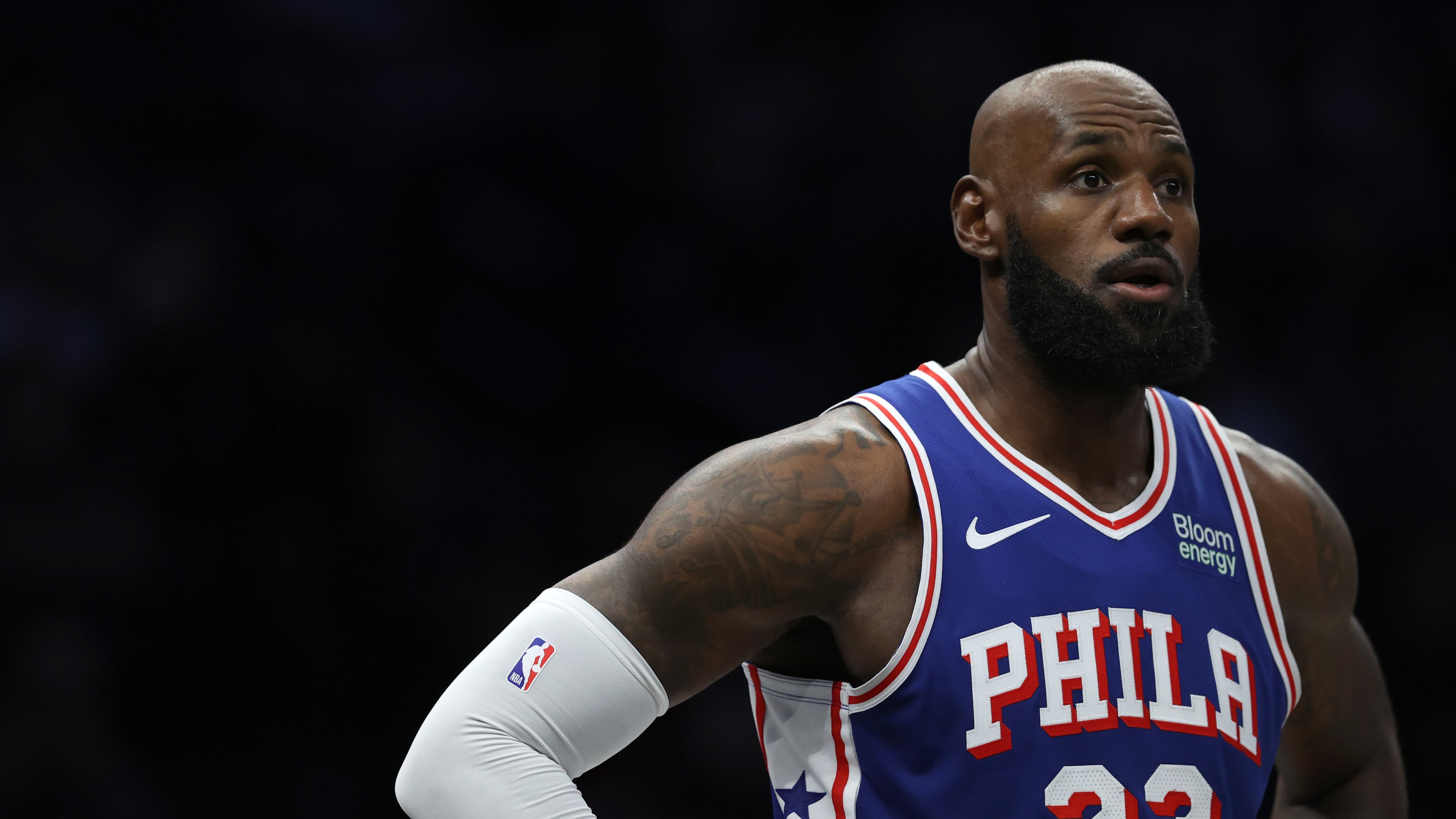 Philadelphia 76ers' LeBron James looks on during the first half of a preseason NBA basketball game against the Brooklyn Nets, Thursday, Oct. 8, 2026, in New York. (AP Photo/Pamela Smith)