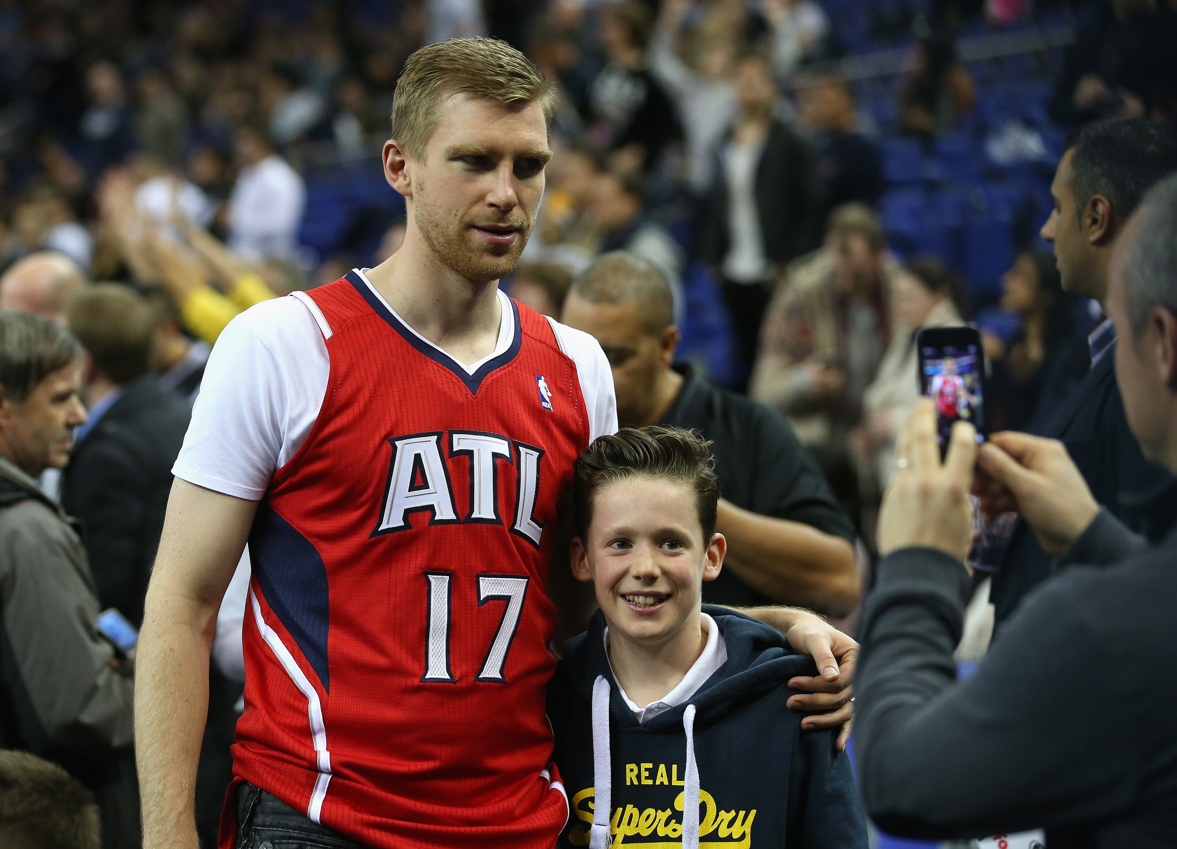 Arsenal player Per Mertesacker is seen before the Eastern Conference NBA match between Brooklyn Nets and Atlanta Hawks at O2 Arena on January 16, 2014 in London, England.