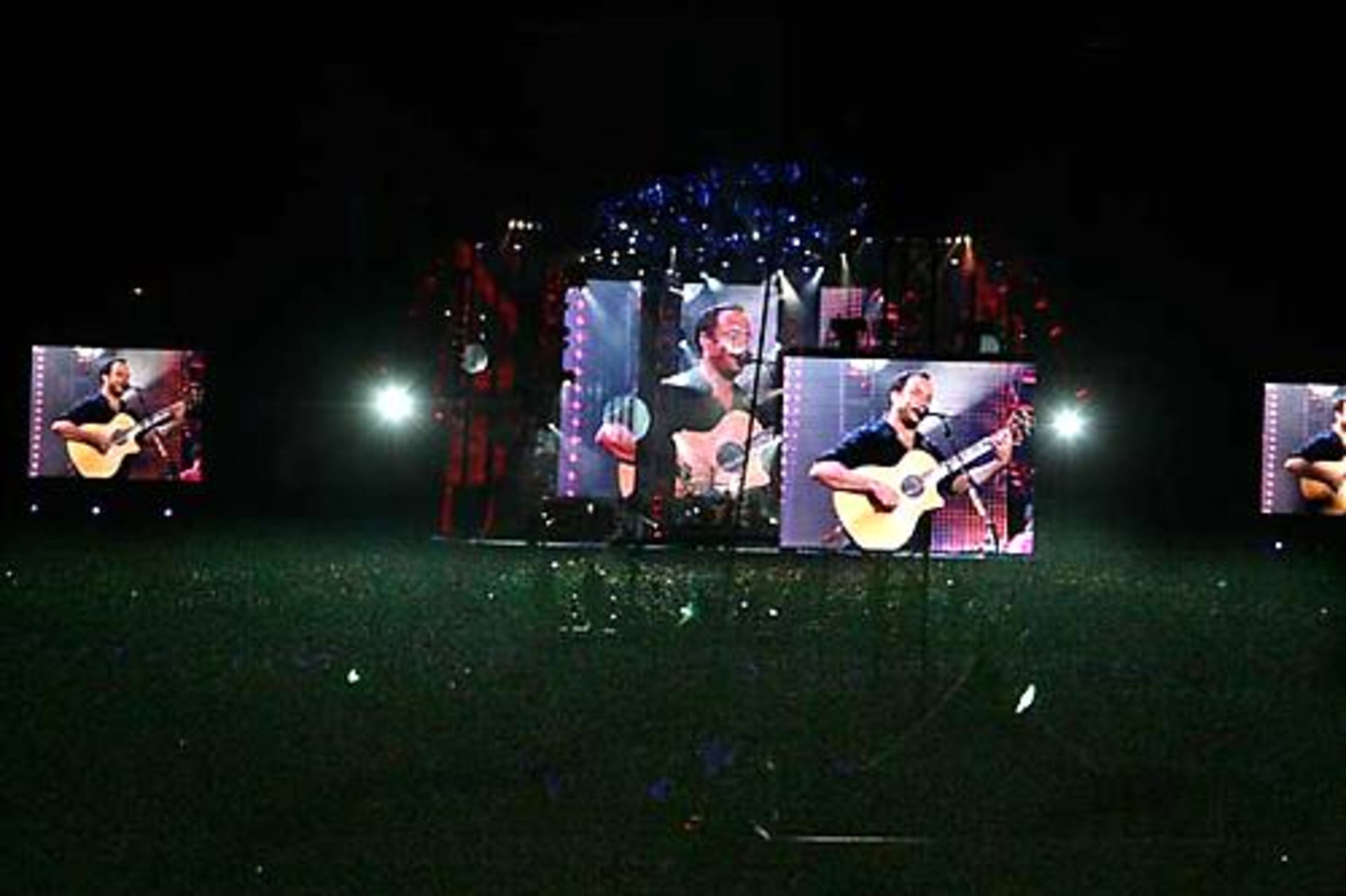 A view of the stage with its massive video screen setup as The Dave Matthews Band plays at The Green Concert.