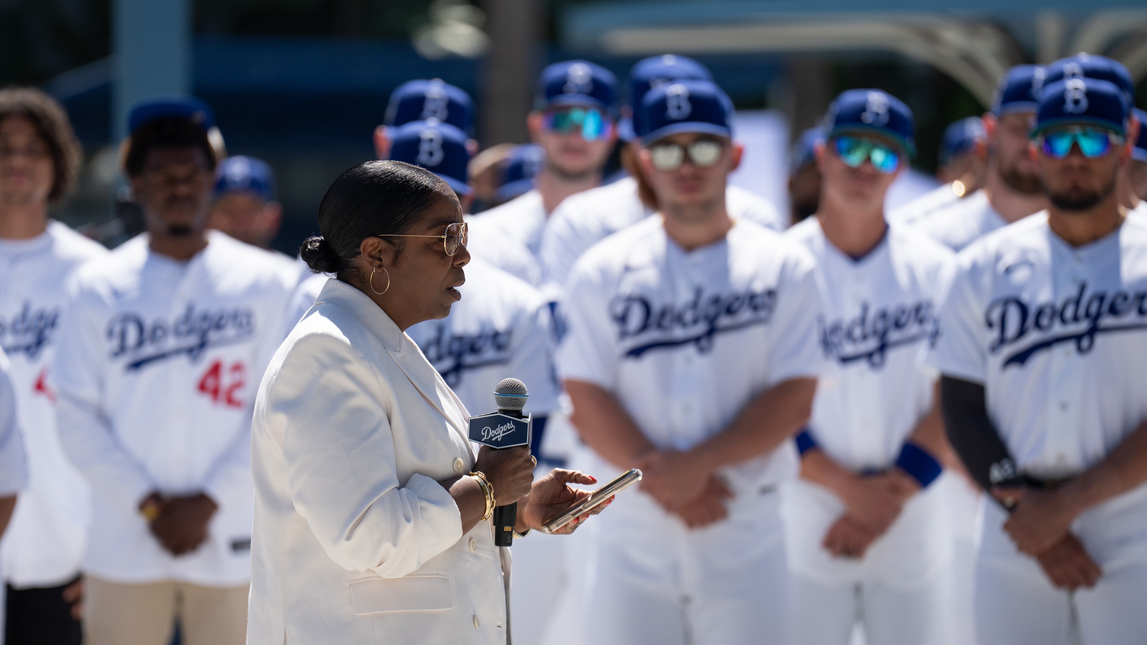Jackie Robinson's granddaughter, Sonya Pankey Robinson, speaks as members of the Los Angeles Dodgers and the New York Mets gather for a ceremony before a baseball game Wednesday, April 15, 2026, in Los Angeles. (AP Photo/Jae C. Hong)