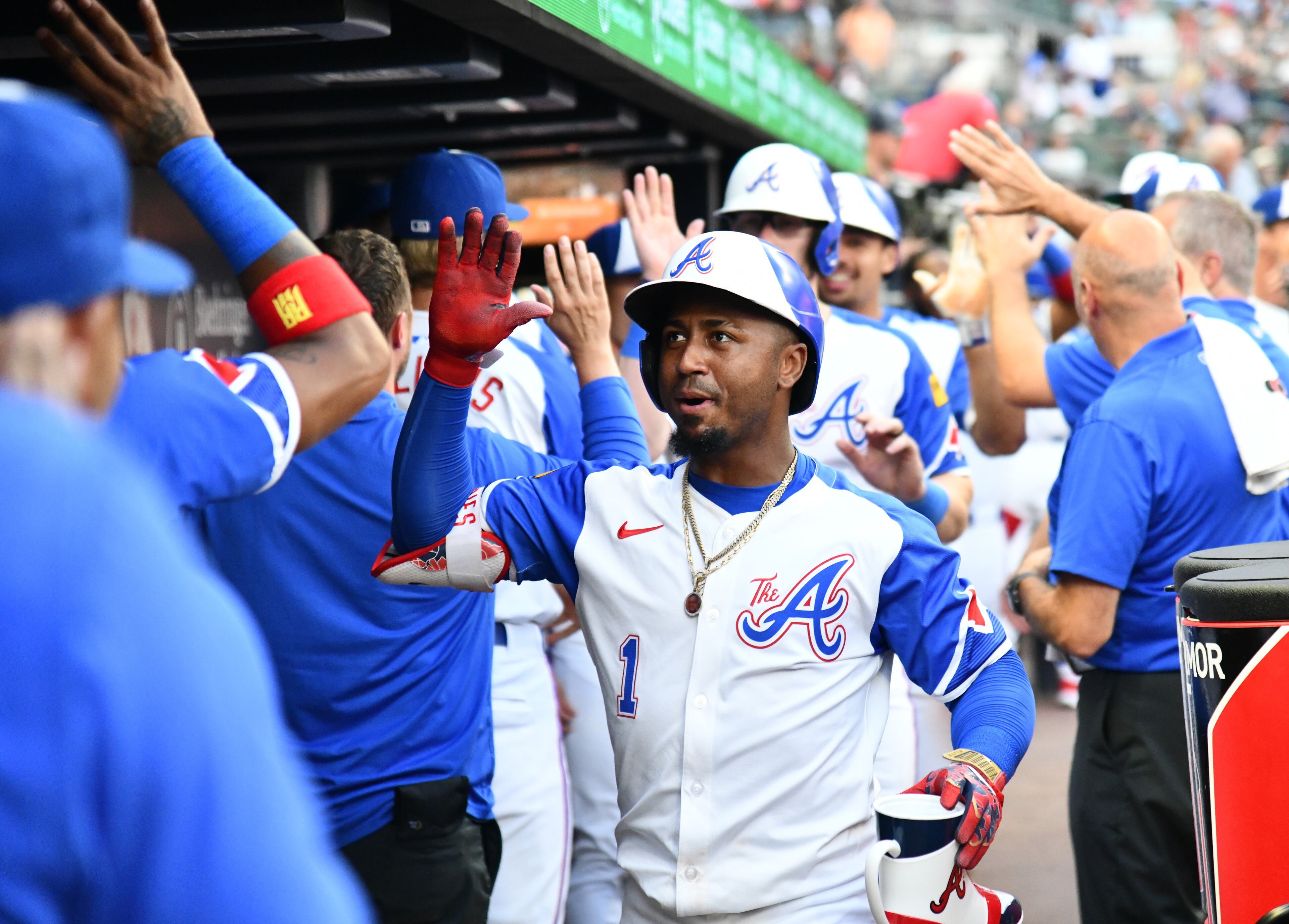 Atlanta Braves second base Ozzie Albies (1) celebrates with teammates after hitting a 3-run home run during the fourth inning of a baseball game at Truist Park, Saturday, July 19, 2025, in Atlanta. New York Yankees won 12-9 over Atlanta Braves. (Hyosub Shin / AJC)