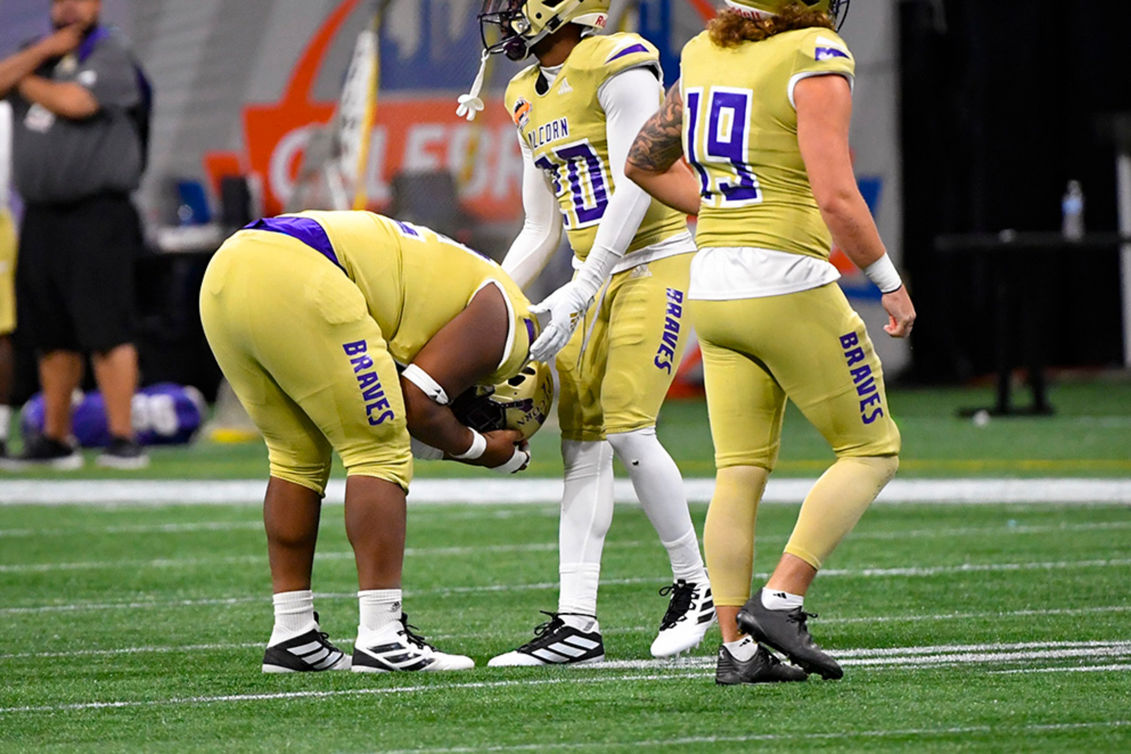 Alcorn State defensive lineman Kee Wayne Jones is consoled by defensive back Allen Bruce (20) after North Carolina A&T scored a touchdown during the second half of the Celebration Bowl Saturday, Dec. 21, 2019, at Mercedes-Benz Stadium in Atlanta.