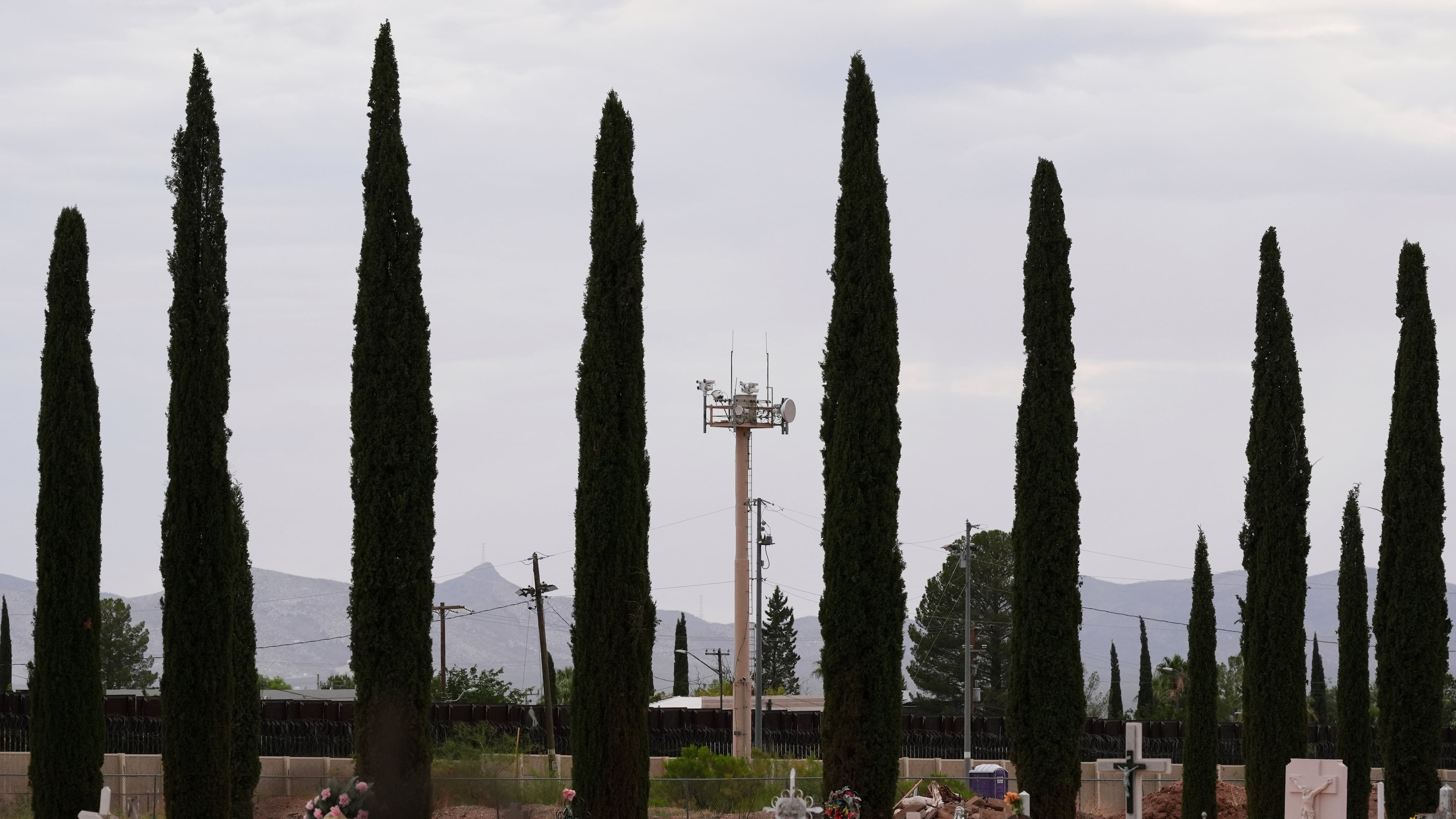 FILE - Surveillance technology used by various law enforcement sit on a tower at the border wall, July 28, 2025, in Douglas, Ariz. (AP Photo/Ross D. Franklin, File)