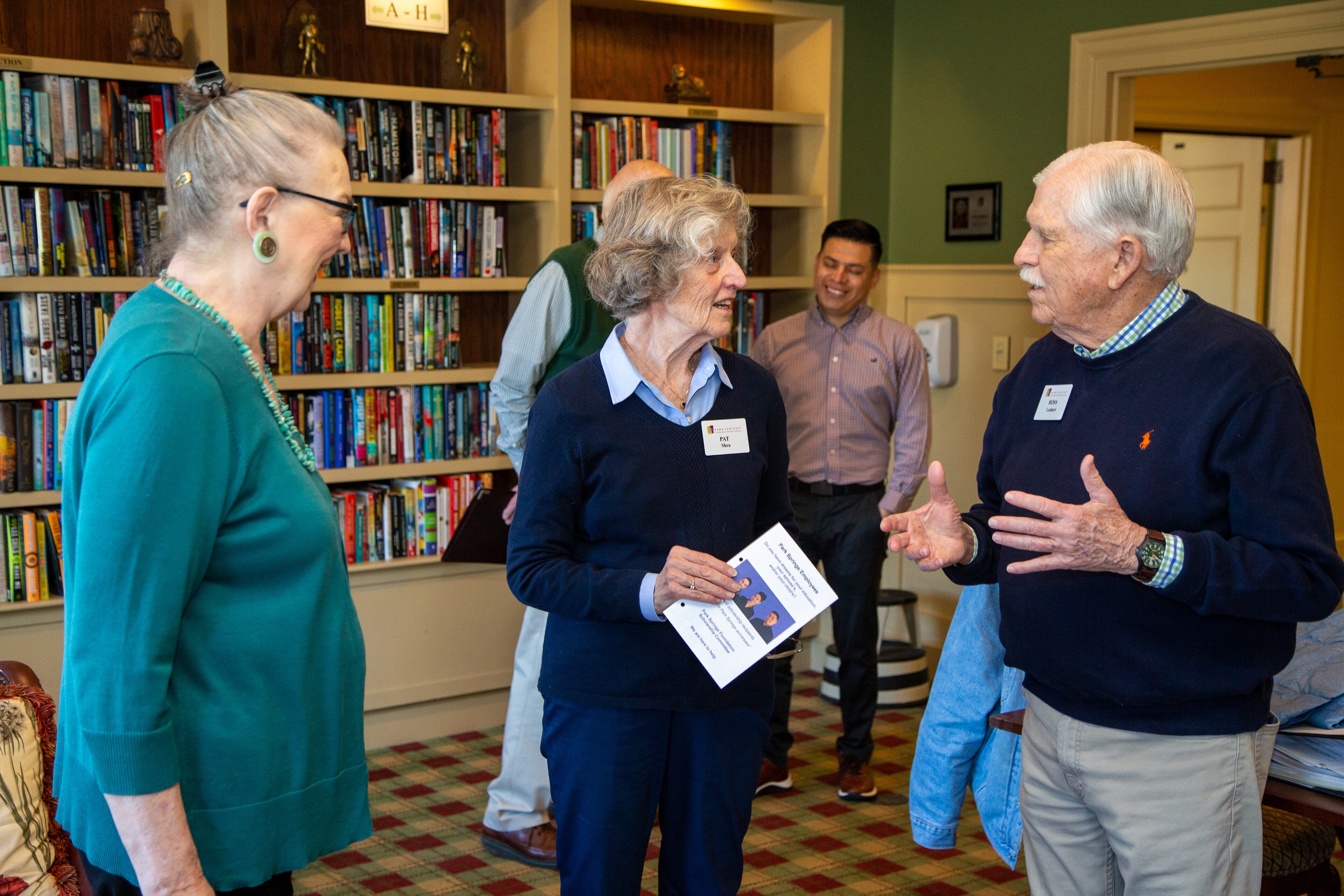 Barbara Cooper (from left), Pat Shea and Ross Lenhart talk in the Park Springs library. PHIL SKINNER FOR THE ATLANTA JOURNAL-CONSTITUTION.
