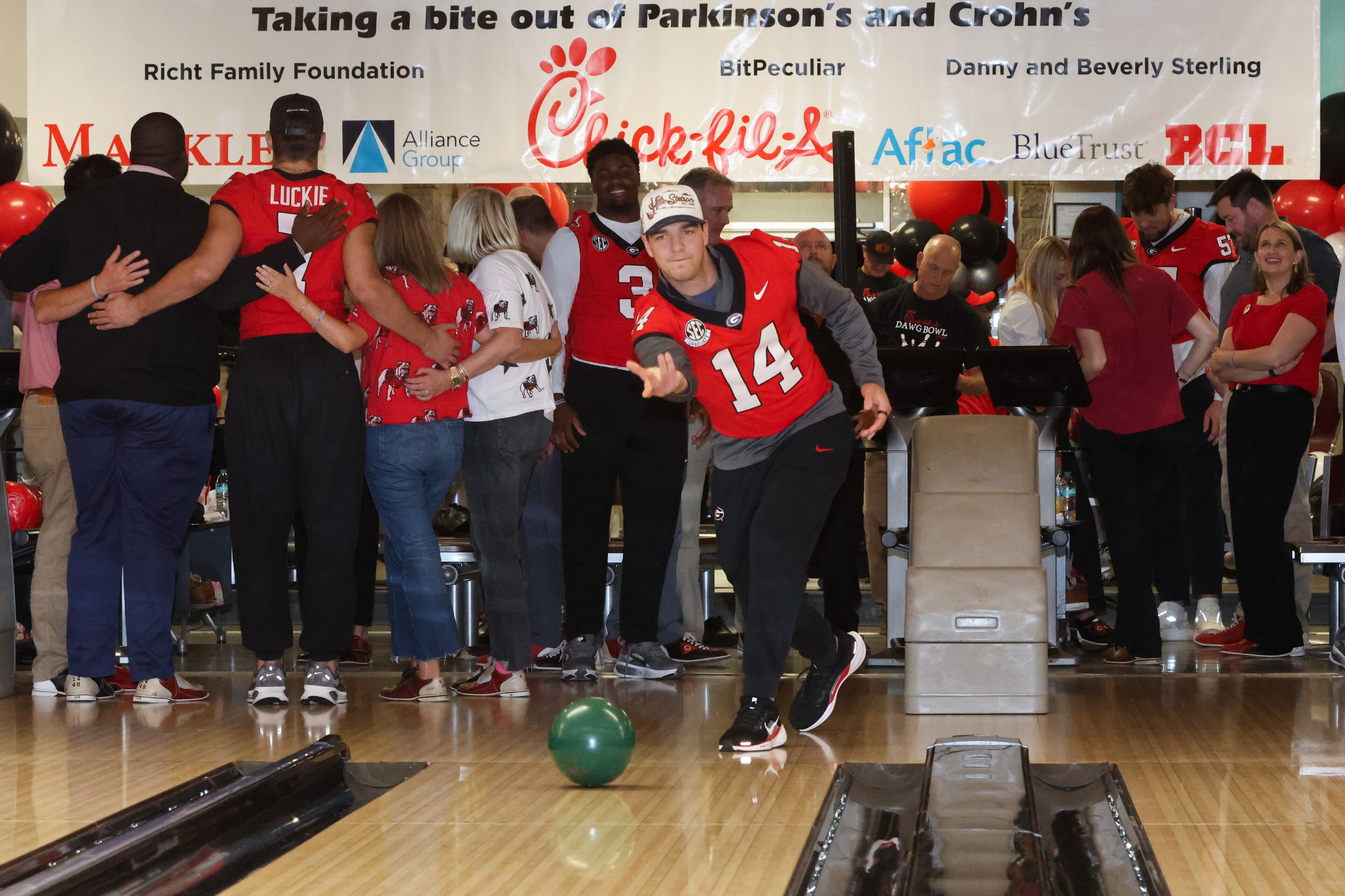 UGA quarterback Gunner Stockton (14) bowls during the third annual Chick-fil-A Dawg Bowl fundraiser for Parkinson’s and Crohn’s disease research at Showtime Bowl in Athens on Wednesday, Oct. 22, 2025. (C.J. Bartunek for the AJC)
