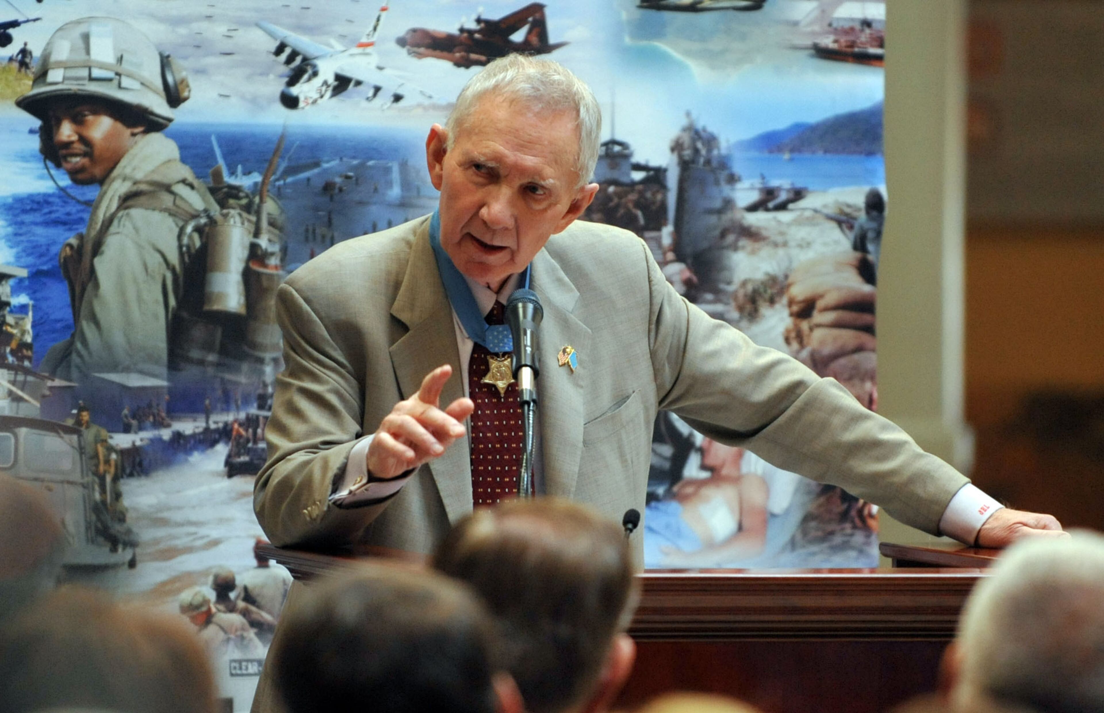Medal of Honor recipient Major General James Livingston, USMC (Ret.) gives remarks during the ceremony. Veterans, family members and state officials attend a ceremony honoring Medal of Honor recipients from the Vietnam War at the Georgia Capitol Tuesday, March 25, 2014. Twelve Georgians, veterans of the Vietnam War, possess the Medal of Honor. It is the highest accolade this nation gives its warriors. On Tuesday, they were recognized in a special ceremony at the Capitol. Gov. Nathan Deal proclaimed March 29 as Vietnam Veterans Day in Georgia. KENT D. JOHNSON / KDJOHNSON@AJC.COM