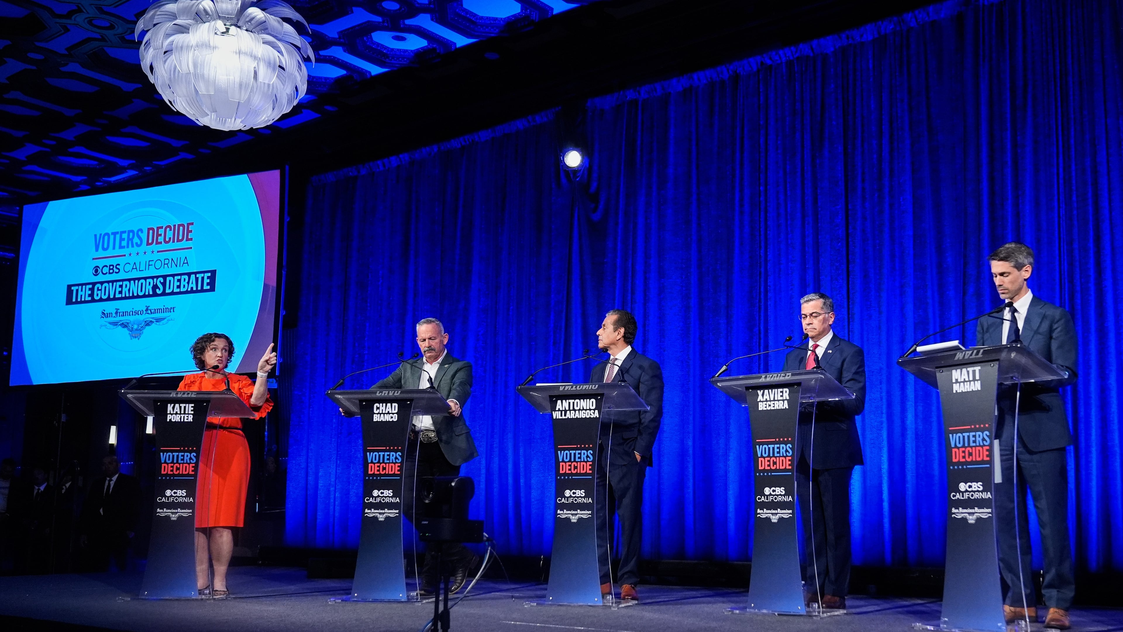 From left, Katie Porter speaks as Chad Bianco, Antonio Villaraigosa, Xavier Becerra and Matt Mahan listen during a California gubernatorial debate hosted by CBS Bay Area and the San Francisco Examiner in San Francisco, Thursday, May 14, 2026. (AP Photo/Godofredo A. Vásquez, Pool)