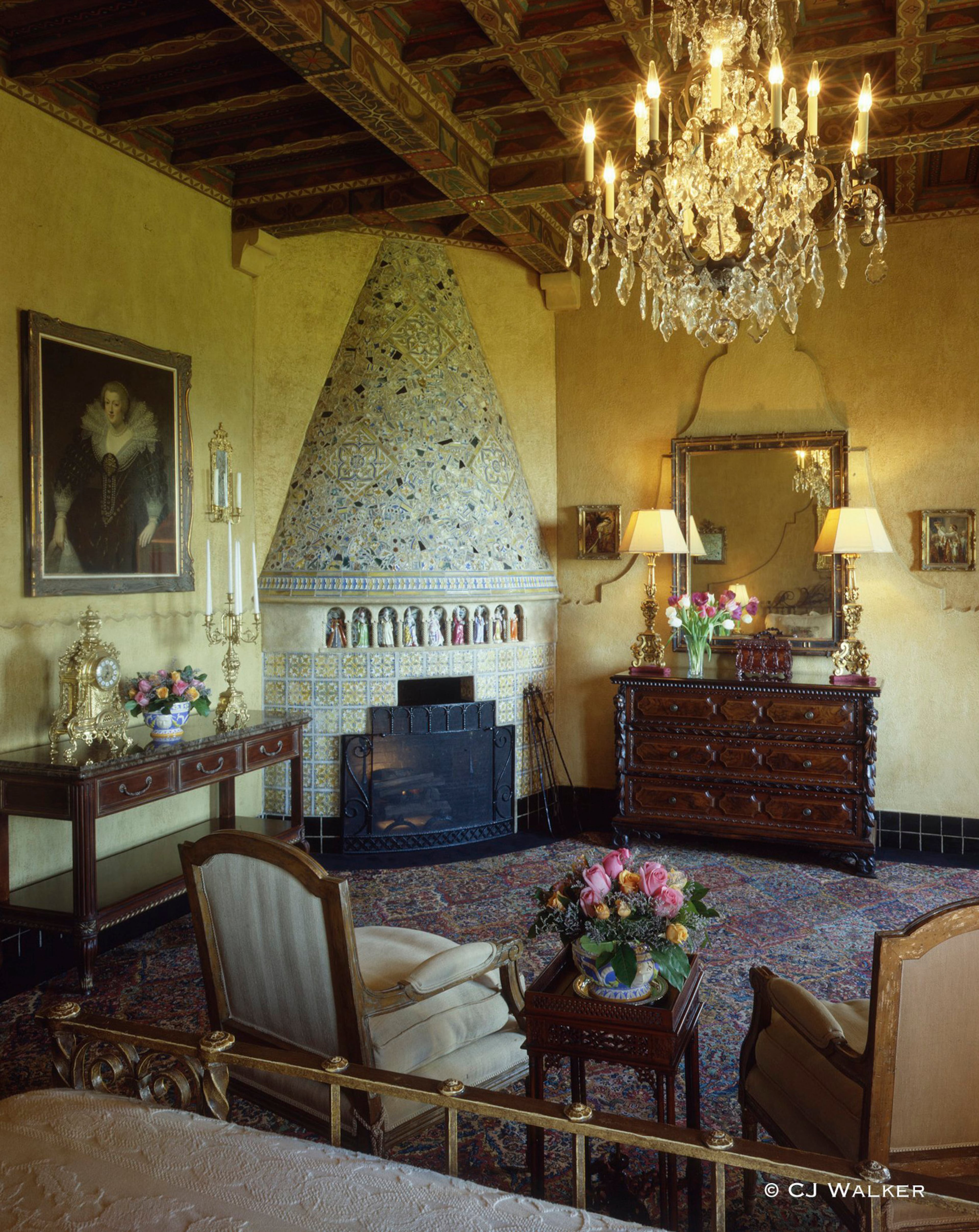 The Spanish Room, as it appeared in 1996, is one of Mar-a-Lago's most famous guest rooms. Porcelain ladies-in-waiting stand in tiny arches decorating the tiled "beehive" fireplace. Photo C.J. Walker