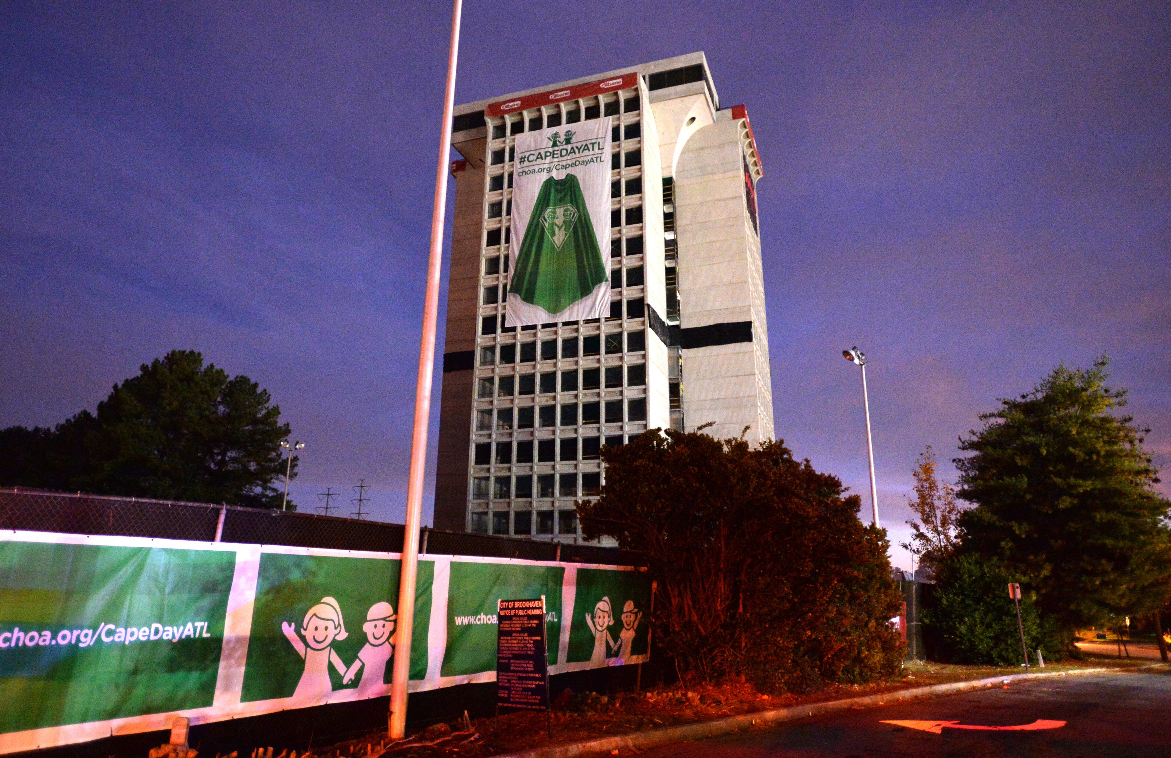 he 19-story former Executive Park Motor building just before it was imploded at the corner of I-85 and North Druid Hills Road on Saturday morning, November 8, 2014. HYOSUB SHIN / HSHIN@AJC.COM