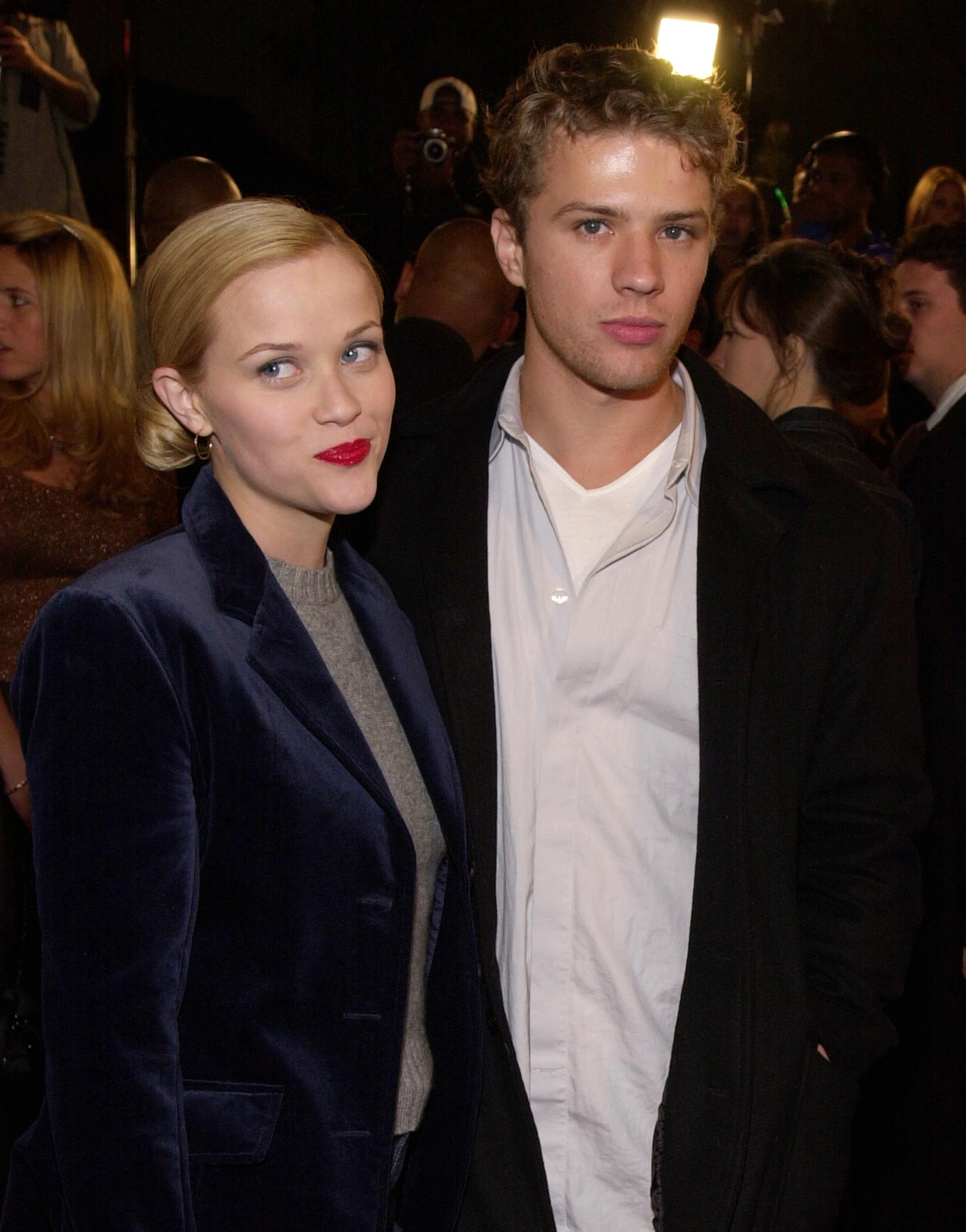 Actress Reese Witherspoon and husband Ryan Phillippe arrive at the premiere of New Line's "Little Nicky" November 2, 2000 at Mann's Chinese Theatre in Hollywood, CA. (Photo by Chris Weeks/Liaison)