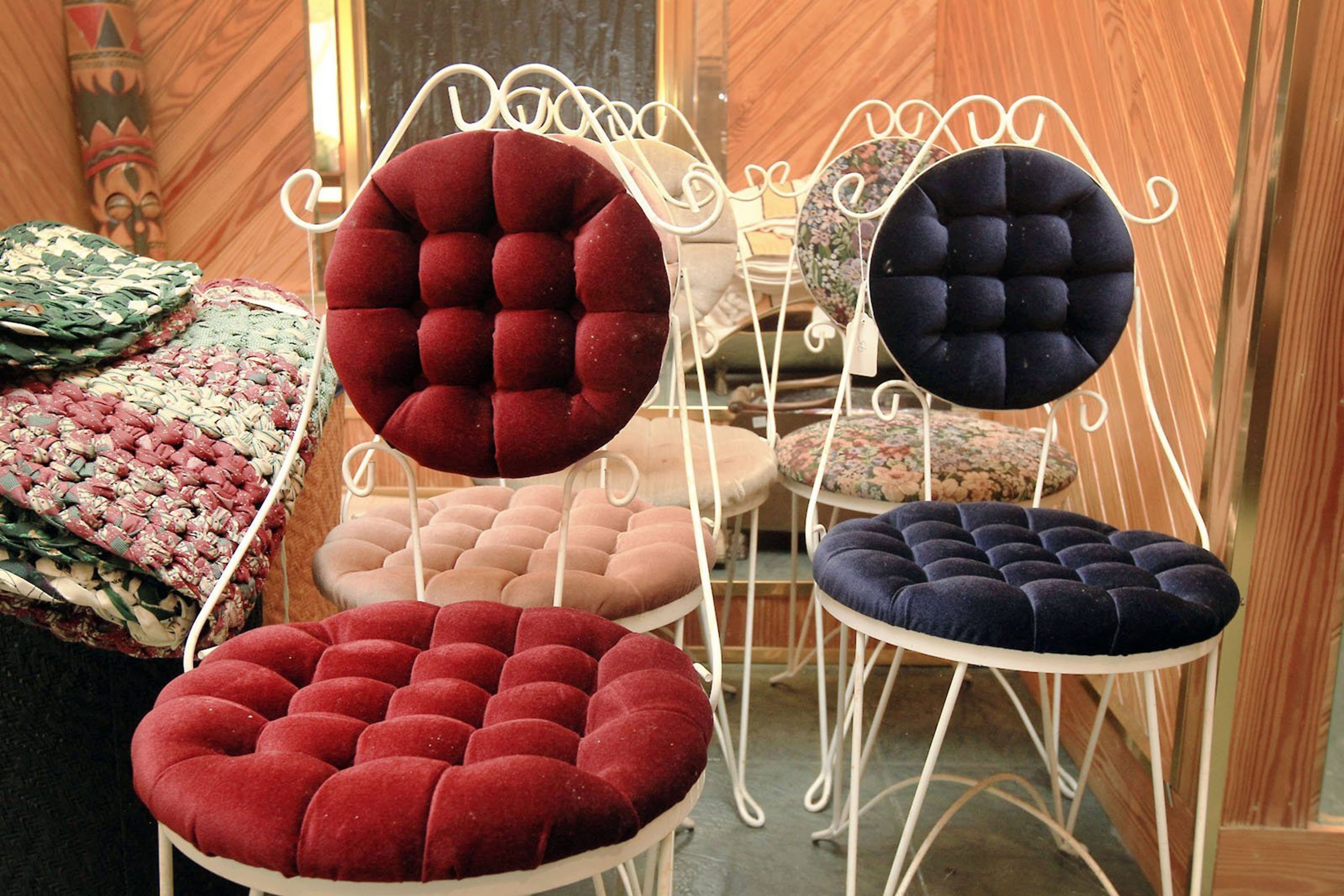 Salon chairs are lined up against a wall along with boxes of hair products, hair dryers, towels, blankets and other supplies in James Brown's Beech Island, S.C., mansion. The house was plundered for a Christie's auction, but several items still remain.