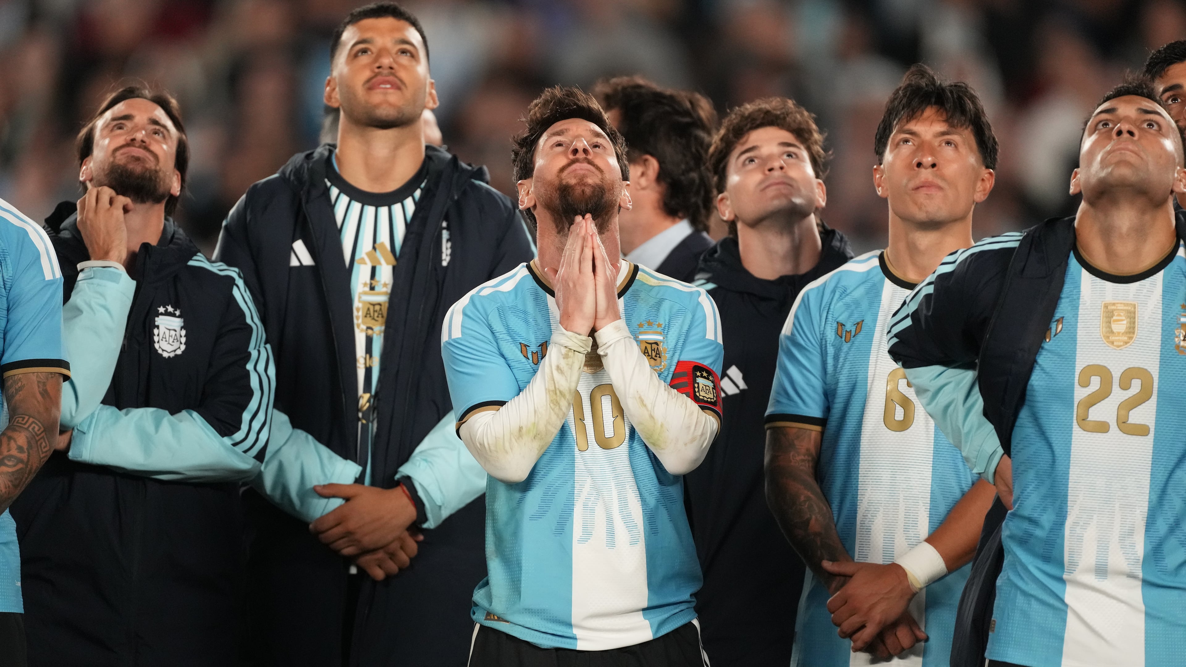 Argentina's Lionel Messi and teammates watch a drone show at the end of his final match for the national team, a soccer friendly against Benin, in Buenos Aires, Argentina, Tuesday, Oct.6, 2026. (AP/Photo/Gustavo Garello)