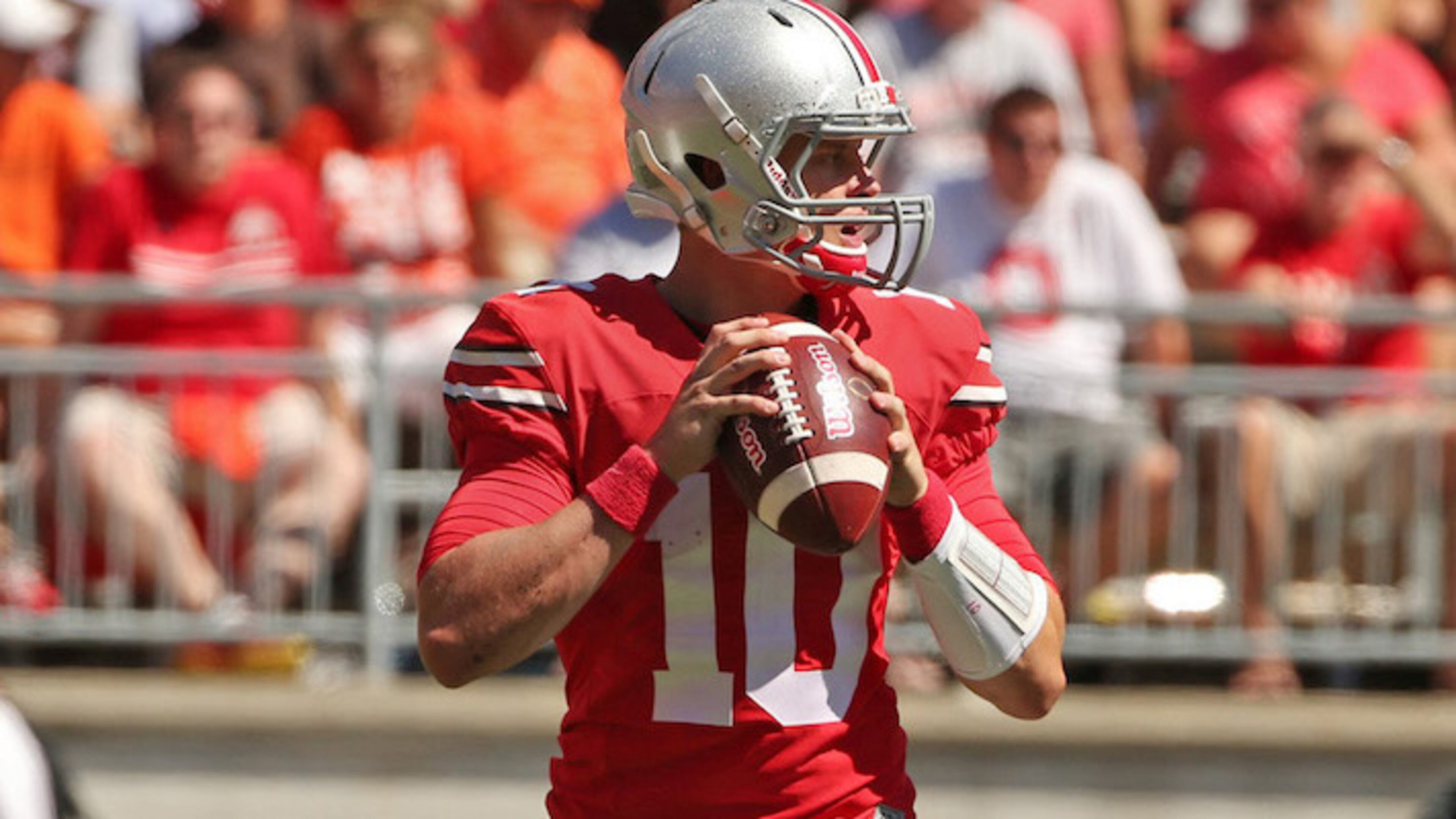 Ohio State quarterback Joe Burrow (10) looks to pass during the second half against Bowling Green at Ohio Stadium in Columbus, Ohio, on Saturday, Sept. 3, 2016. Burrow is transfering to LSU. (Barbara J. Perenic/Columbus Dispatch/TNS)