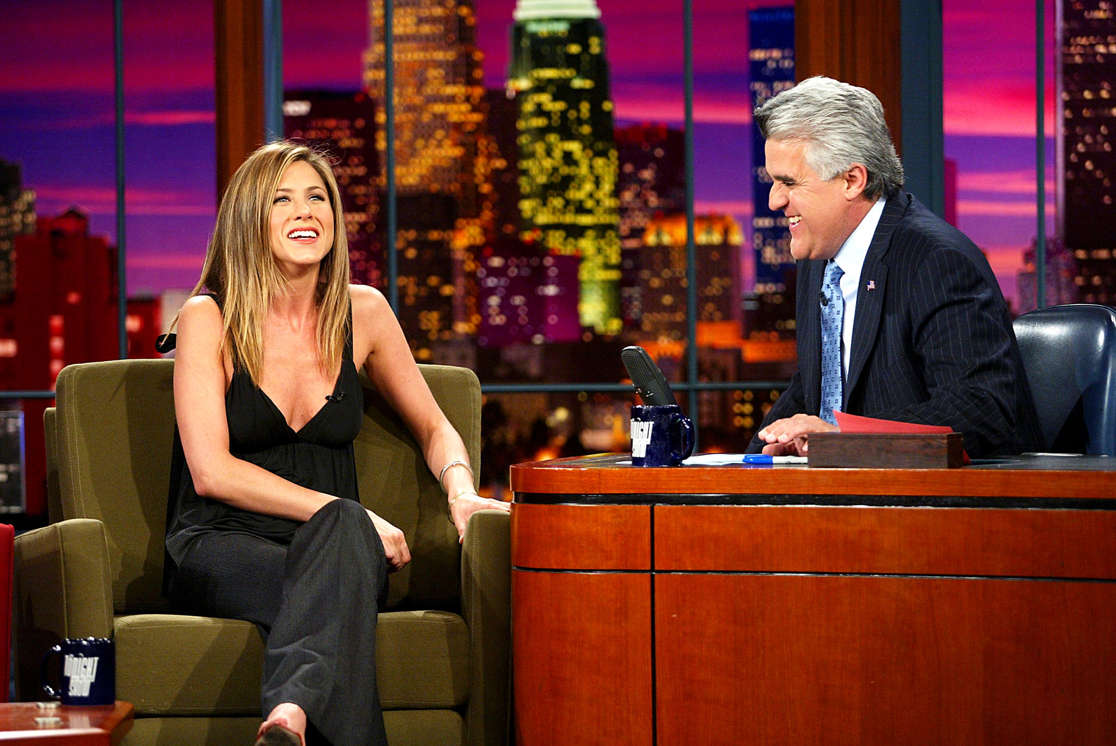 Actress Jennifer Aniston (L) appears on "The Tonight Show with Jay Leno" at the NBC Studios on June 12, 2003 in Burbank, California. (Photo by Kevin Winter/Getty Images)