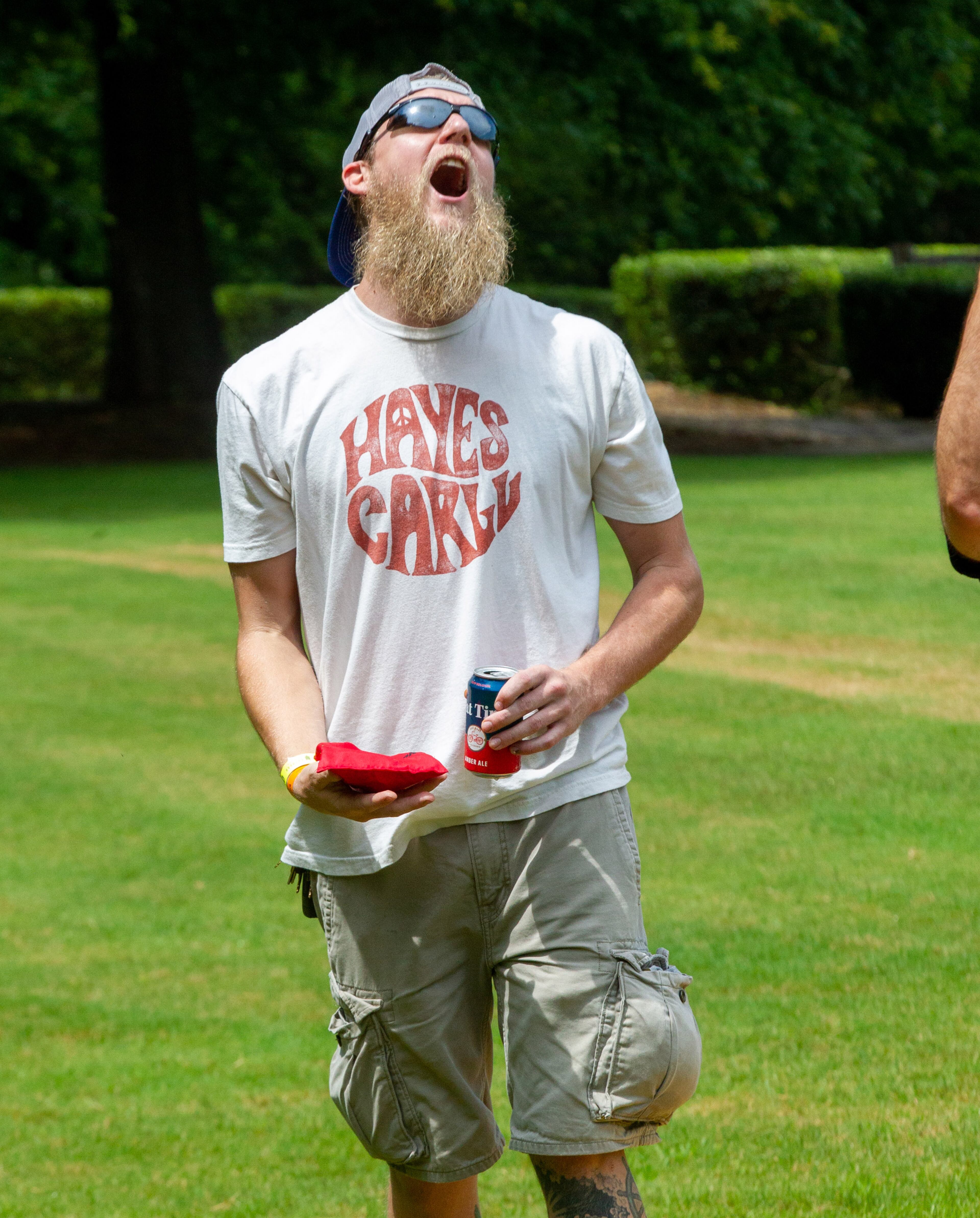 Andrew McElveen reacts to a missed shot during a game of cornhole at the Lost Art Music Festival in Douglasville on Saturday, June 12, 2021. STEVE SCHAEFER FOR THE ATLANTA JOURNAL-CONSTITUTION