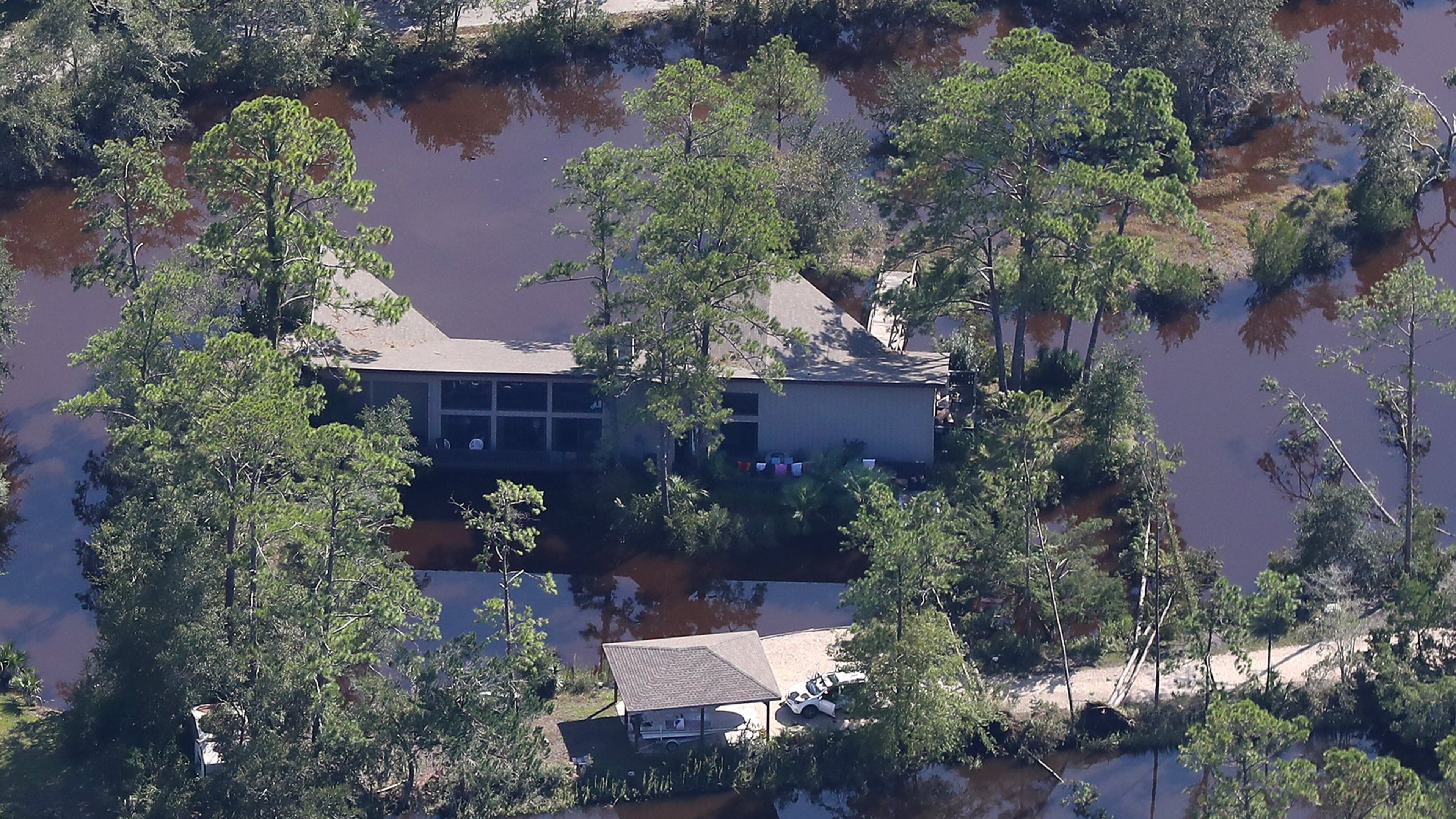 A home on St. Simons Island, on the Georgia coast, is surrounded by water following Hurricane Irma on Tuesday. Curtis Compton/ccompton@ajc.com