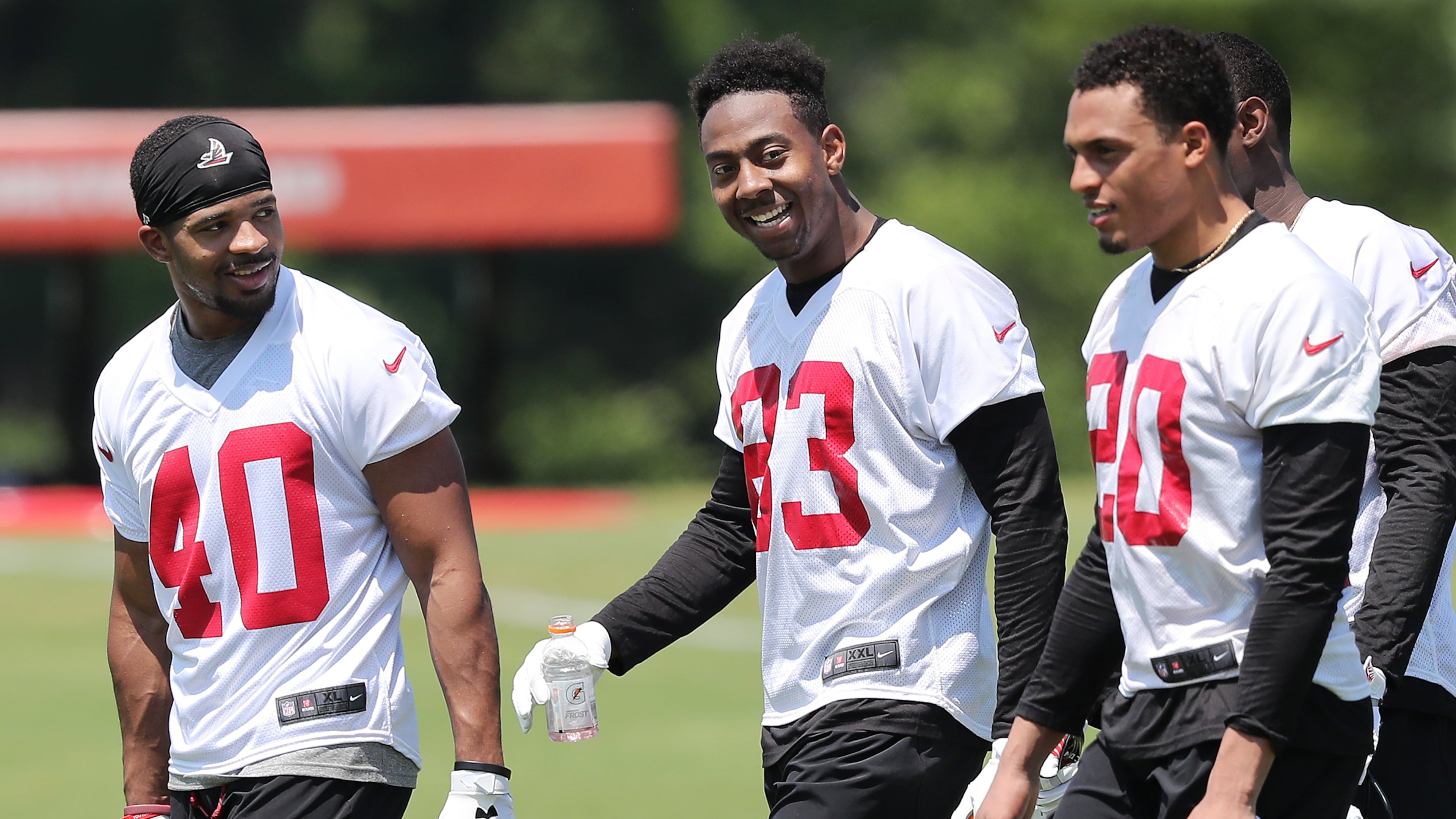Atlanta Falcons safety Tere Calloway (from left), wide receiver Russell Gage, and cornerback Isaiah Oliver walk of the field at the end of the first day of rookie-mini-camp on Friday, May 11, 2018, in Flowery Branch.