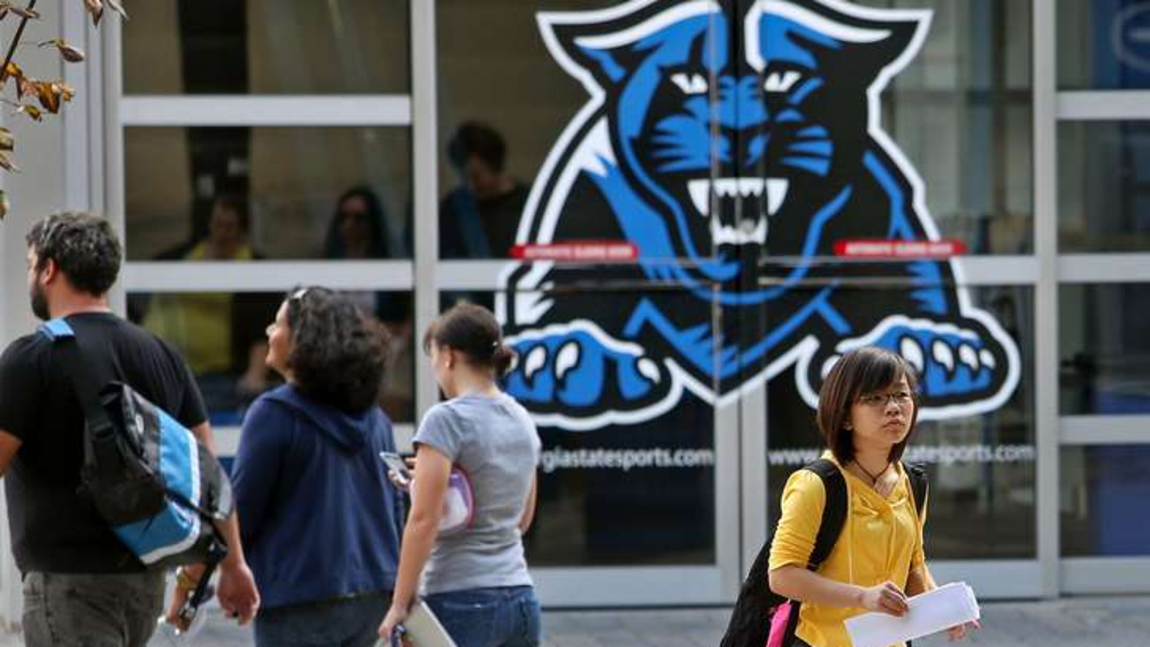 Georgia State University students walk to and from class. The university has more students than any school in the state. Gov. Brian Kemp has proposed a six percent increase in spending for the University System of Georgia as enrollment continues to increase at Georgia State and other state schools. AJC FILE PHOTO