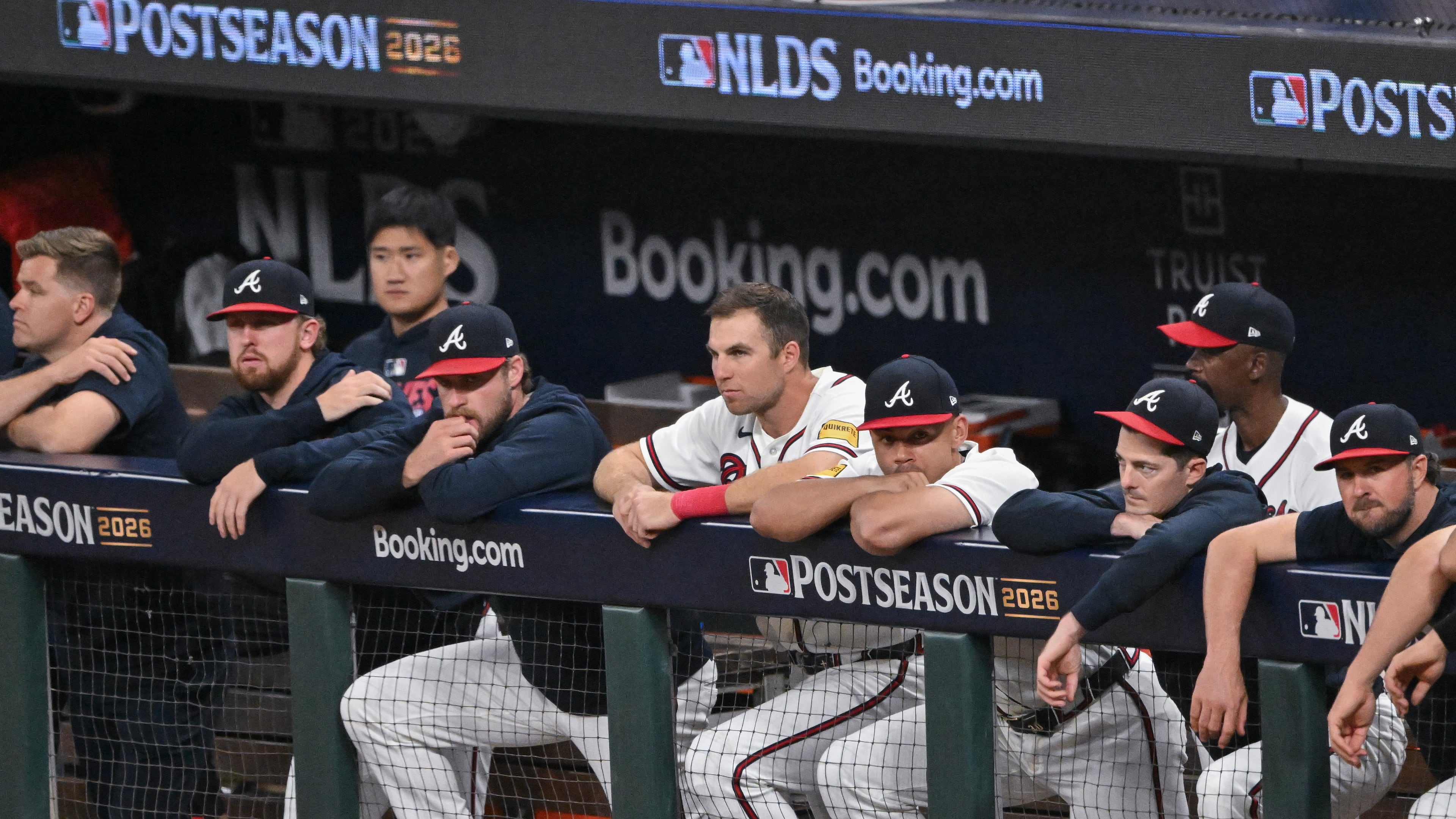 Braves players watch the ninth inning unfold from the dugout during Game 4 of their National League Division Series against the Los Angeles Dodgers on Wednesday, Oct. 7, 2026, in Atlanta. (Hyosub Shin/AJC)
