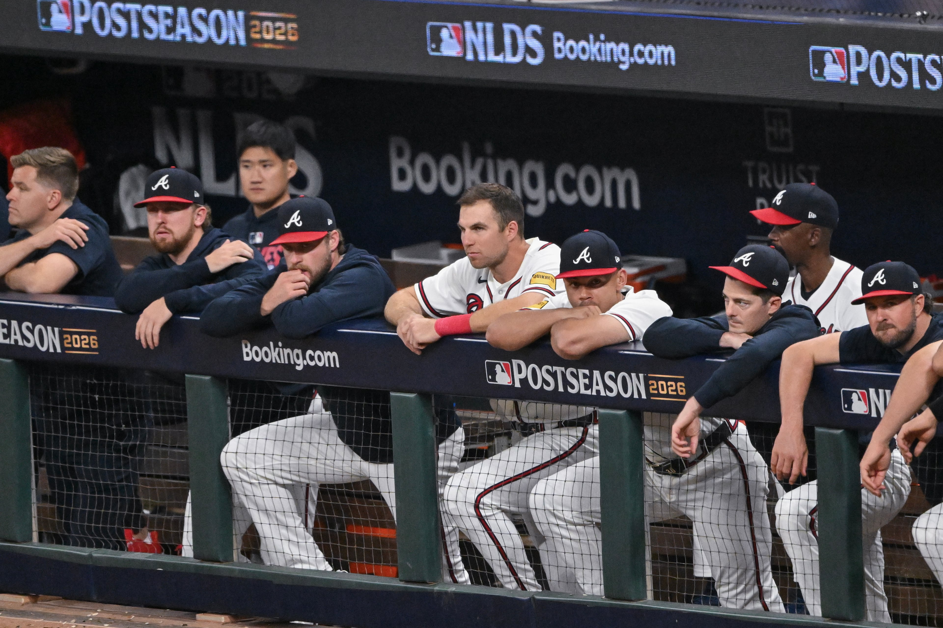 The Atlanta Braves react in the dugout during the ninth inning of Game 4 of the MLB National League Division Series between the Atlanta Braves and the Los Angeles Dodgers, Wednesday, Oct. 7, 2026, in Atlanta. (Hyosub Shin/AJC)