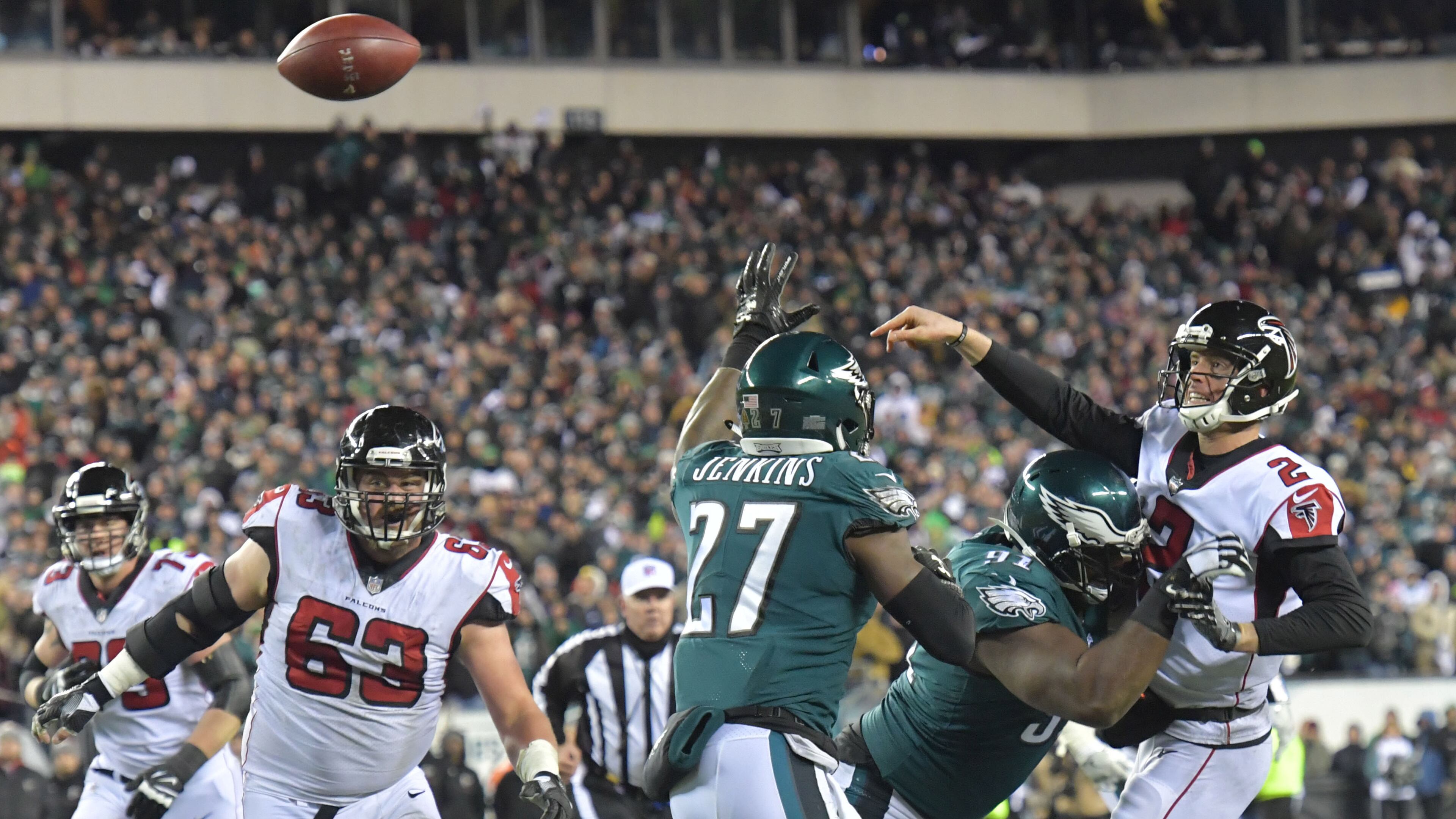 FILE PHOTO -- FALCONS LAST PLAYOFF APPEARANCE -- Atlanta Falcons quarterback Matt Ryan (2) gets off a pass under pressure from Philadelphia Eagles defensive tackle Fletcher Cox (91) in the second quarter during the NFC Divisional Game at Lincoln Financial Field in Philadelphia, PA on Saturday, January 13, 2018. The Falcons' quest for a return to the Super Bowl ended with a loud thud Saturday in a 15-10 loss to the Eagles in an NFC Divisional playoff game at Lincoln Financial Field. HYOSUB SHIN / HSHIN@AJC.COM